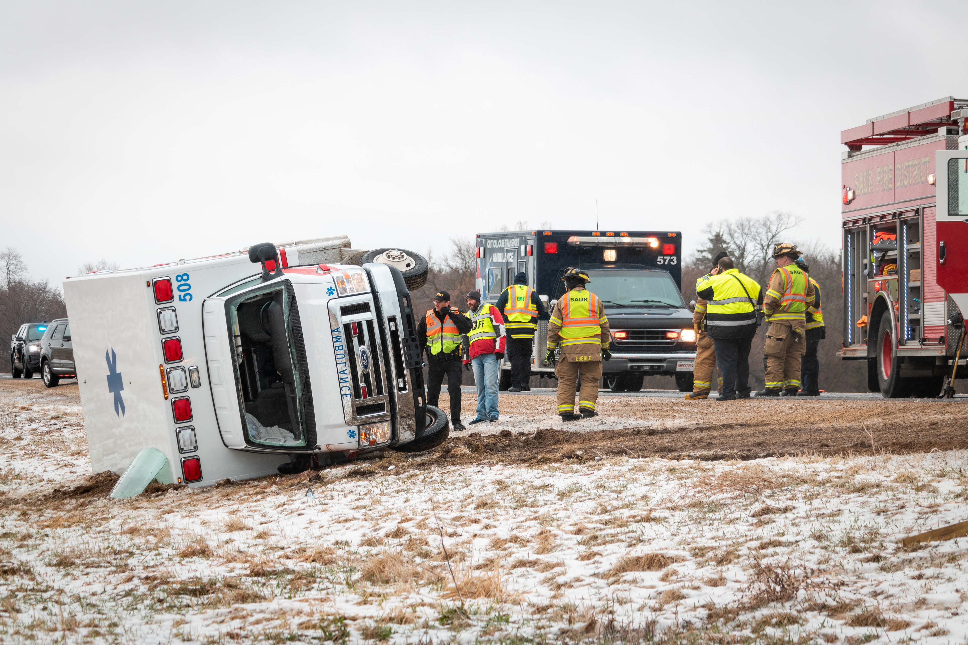 Sauk Praire Ambulance, 508, was rolled onto it's side after slippery roads caused the driver to lose control.