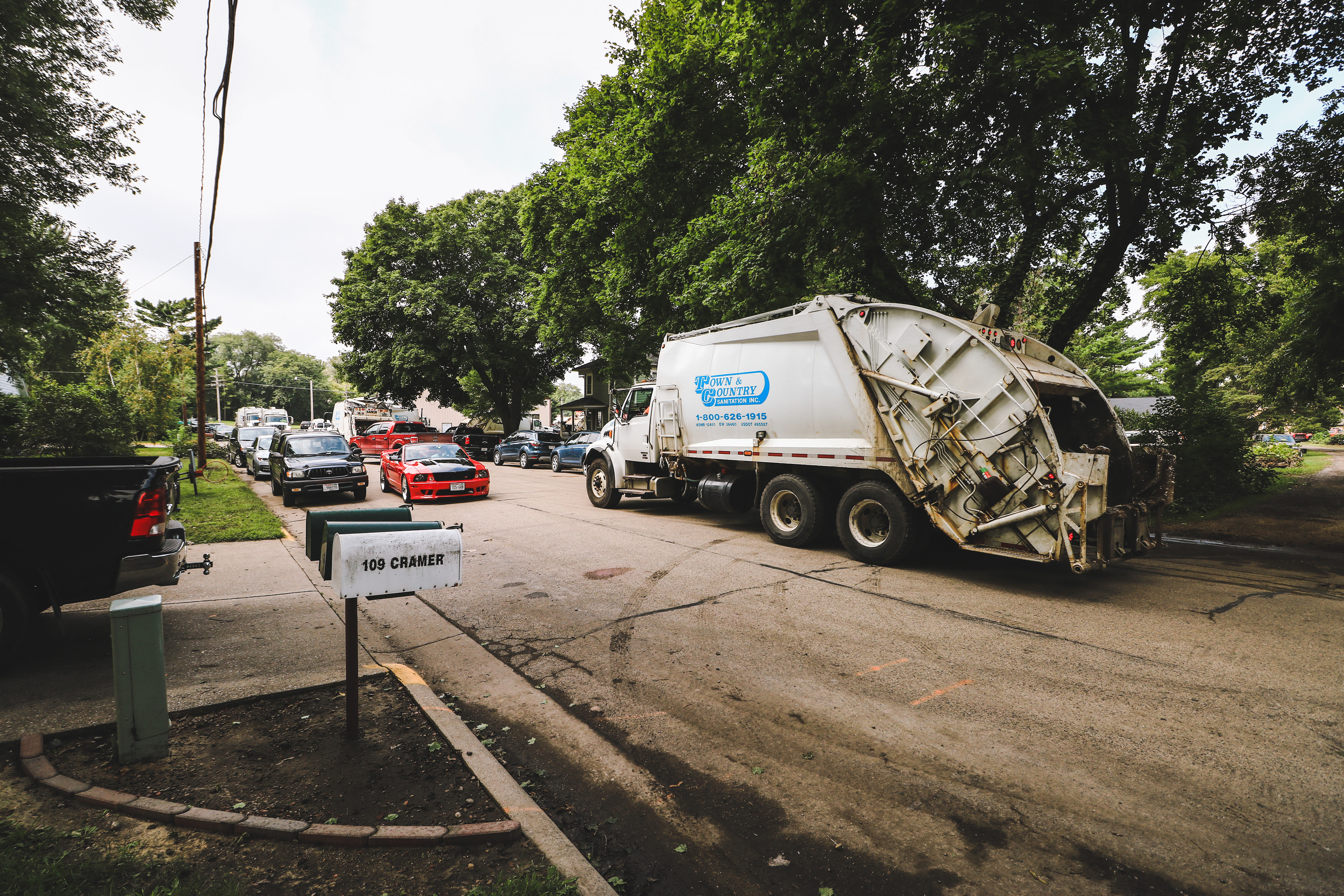 Dozens of garbage trucks filled the streets following the flood to haul away flood damaged belongings.