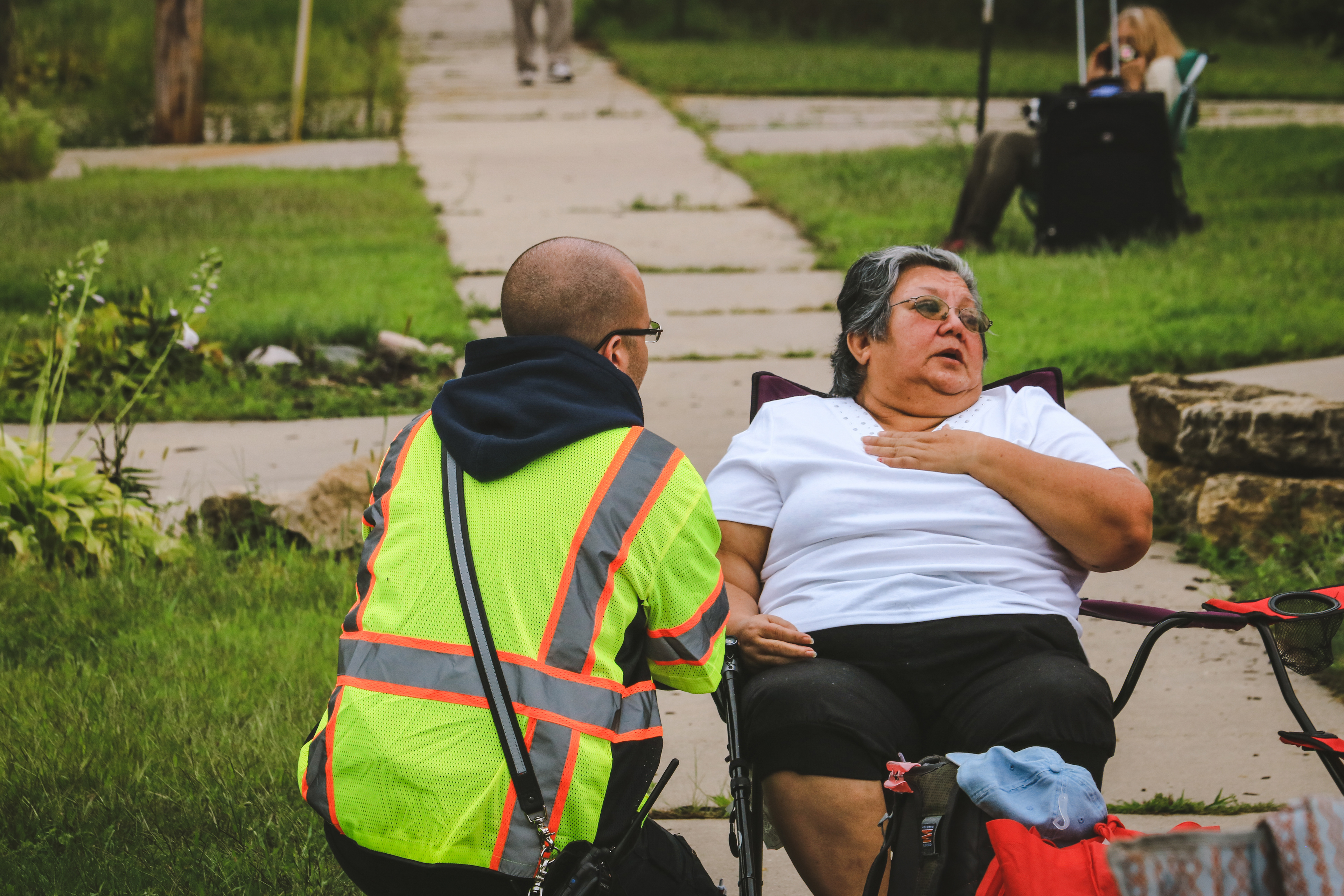 Sauk Prairie EMT, Mike Travis, assists a patient with a medical emergency.