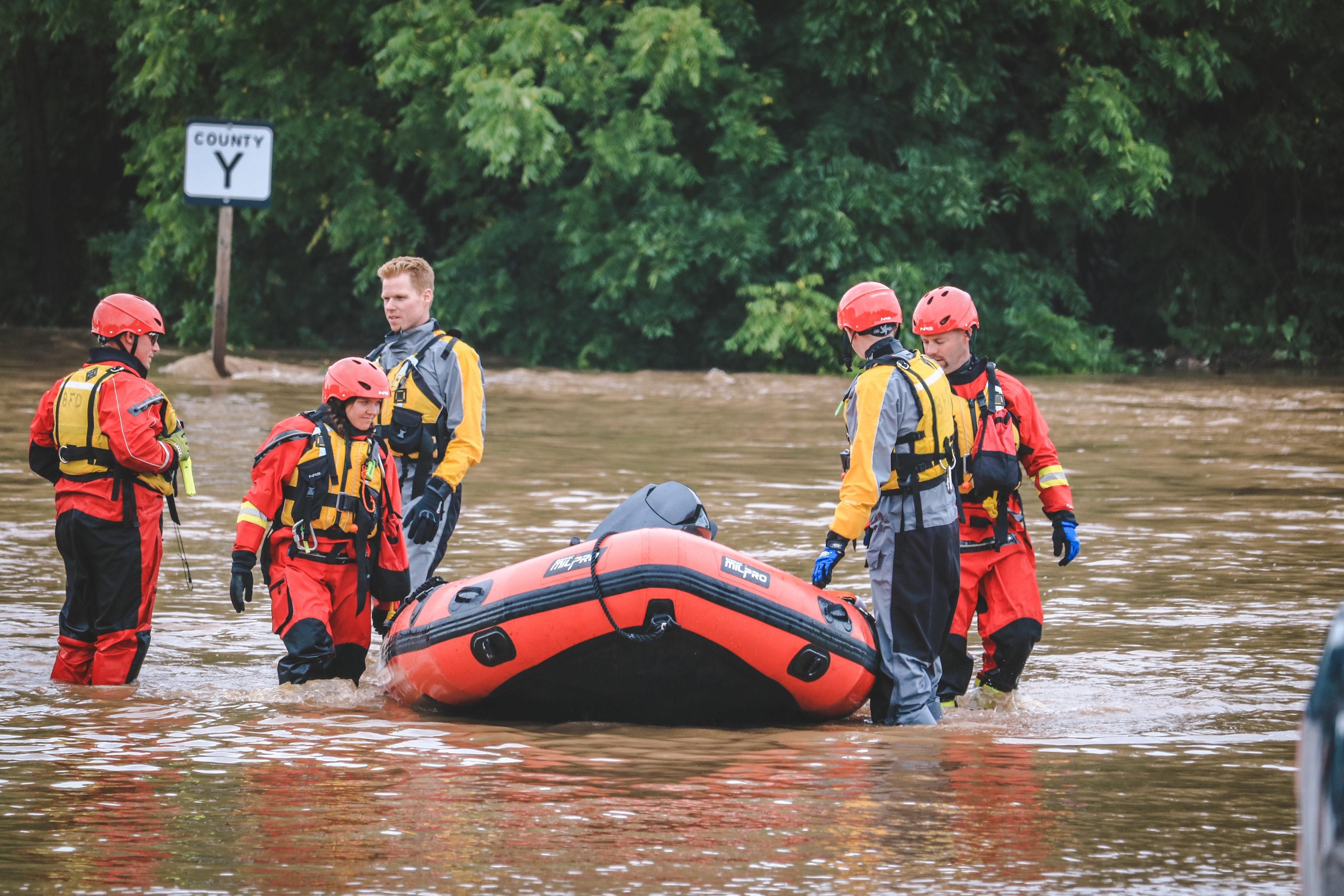 A water rescue team from Beloit assist in a rescue operation.