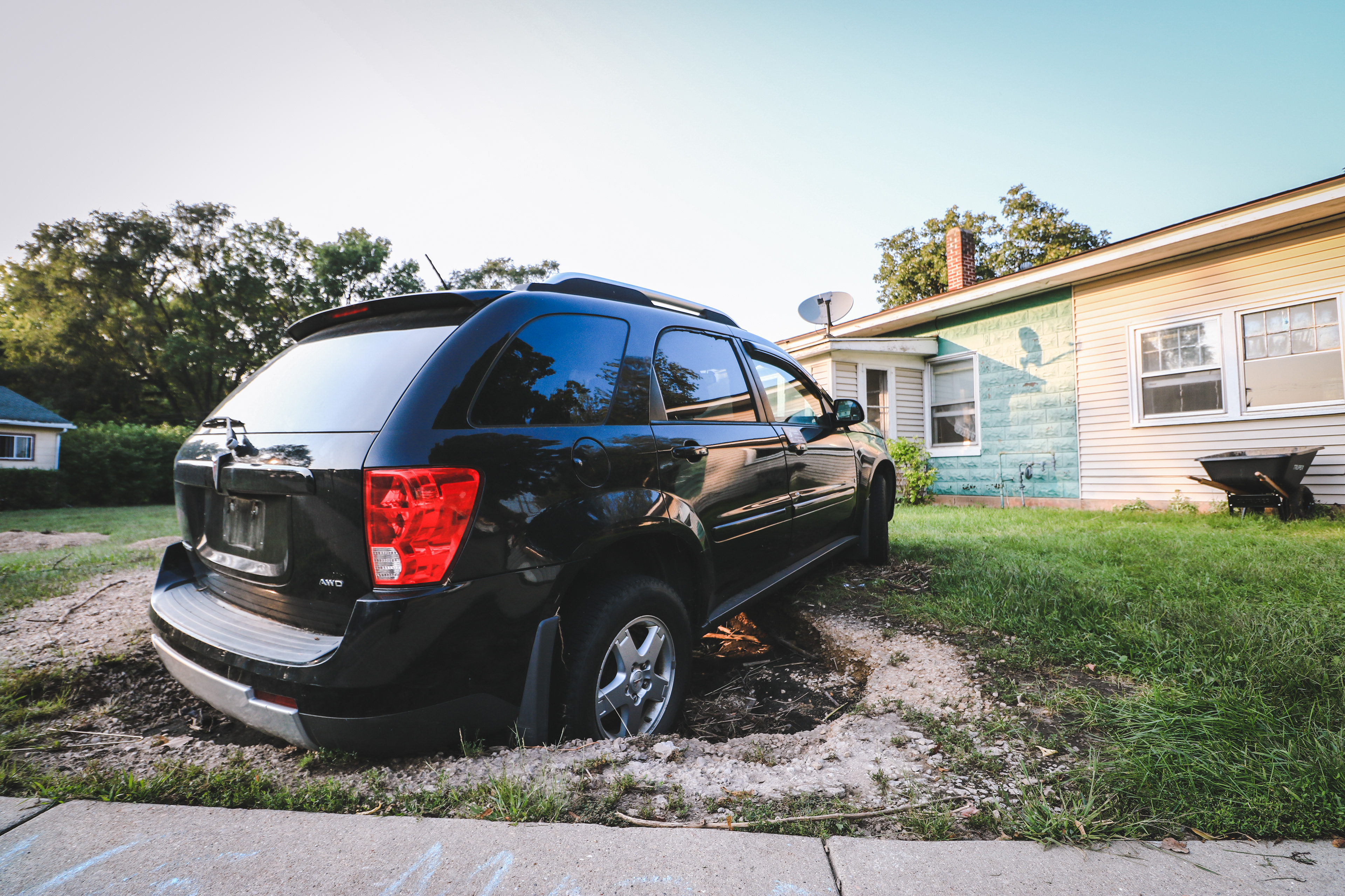 An suv was swept into the driveway of Michael Lawler's home.