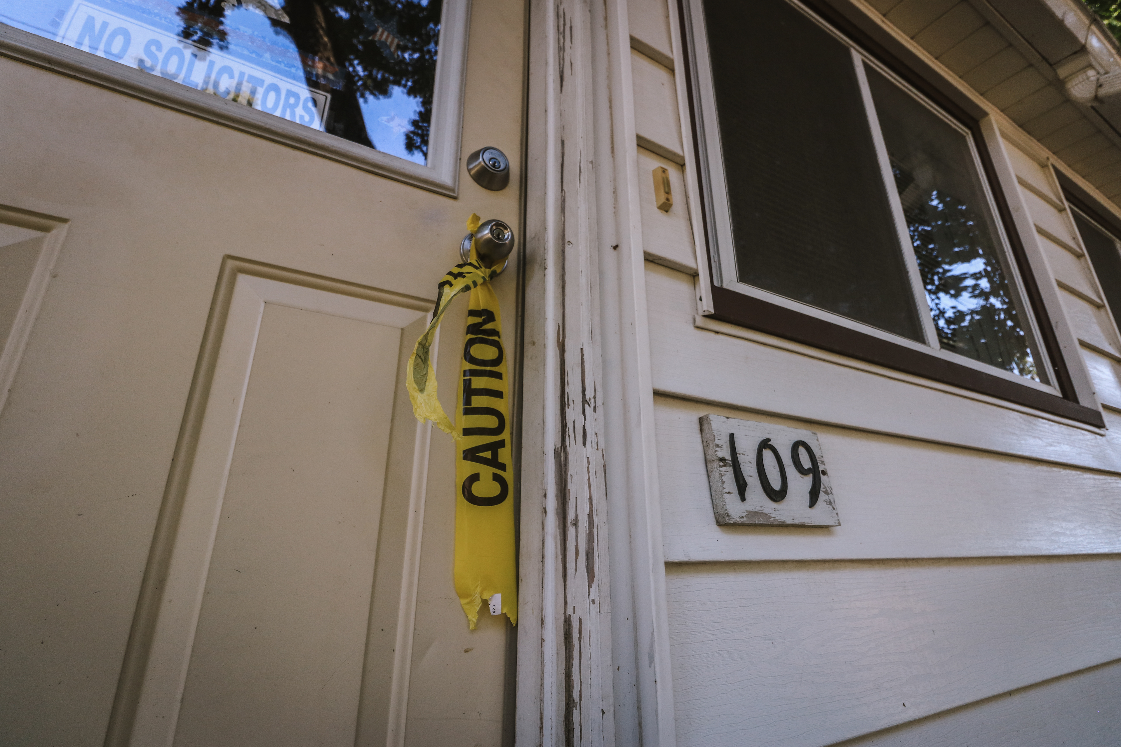 Caution tape was placed on the doorhandles of flooded homes indicating the gas and electricity was turned off to the home.