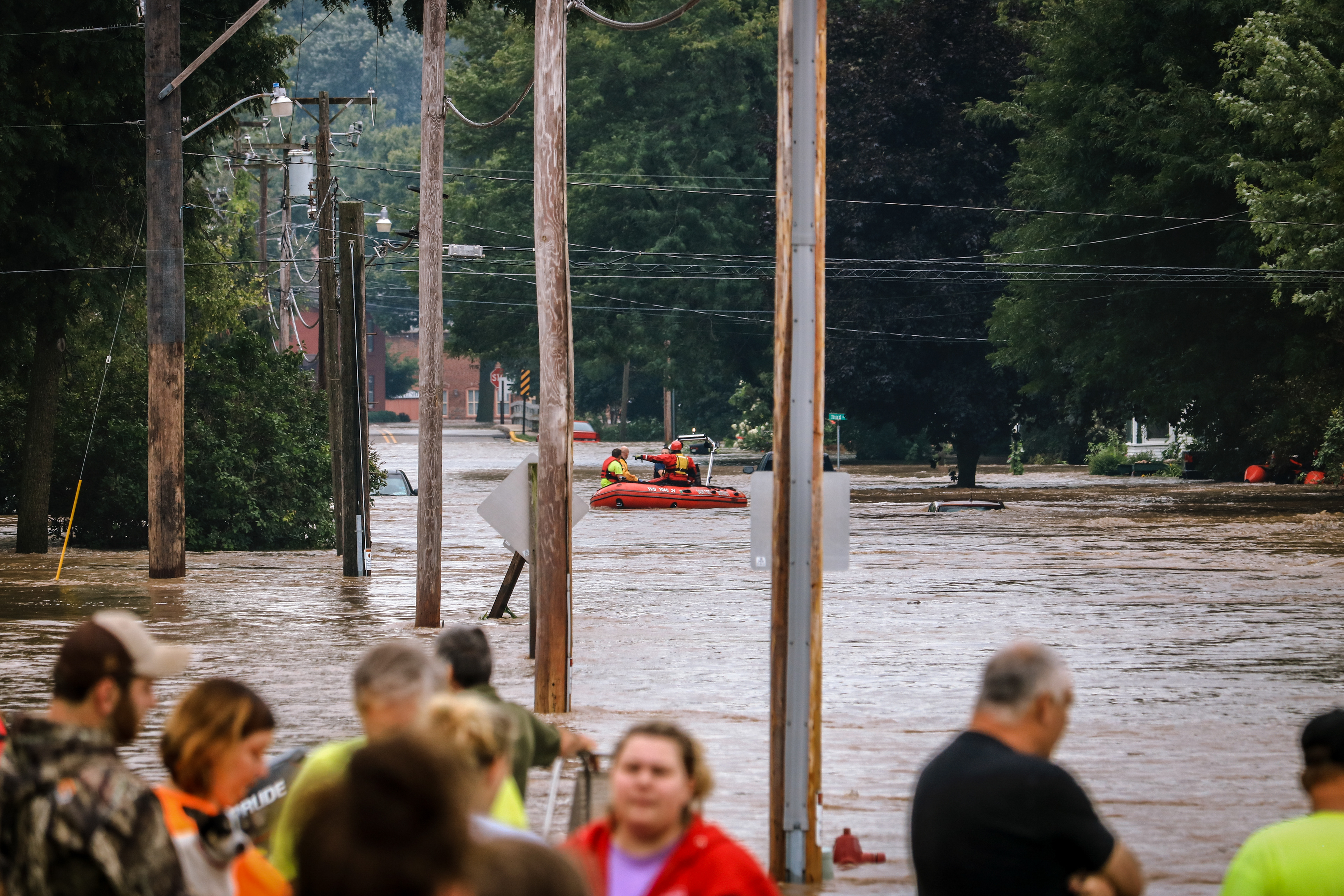 Water rescues continue on State Street, some areas reaching up to 4 feet deep with water.