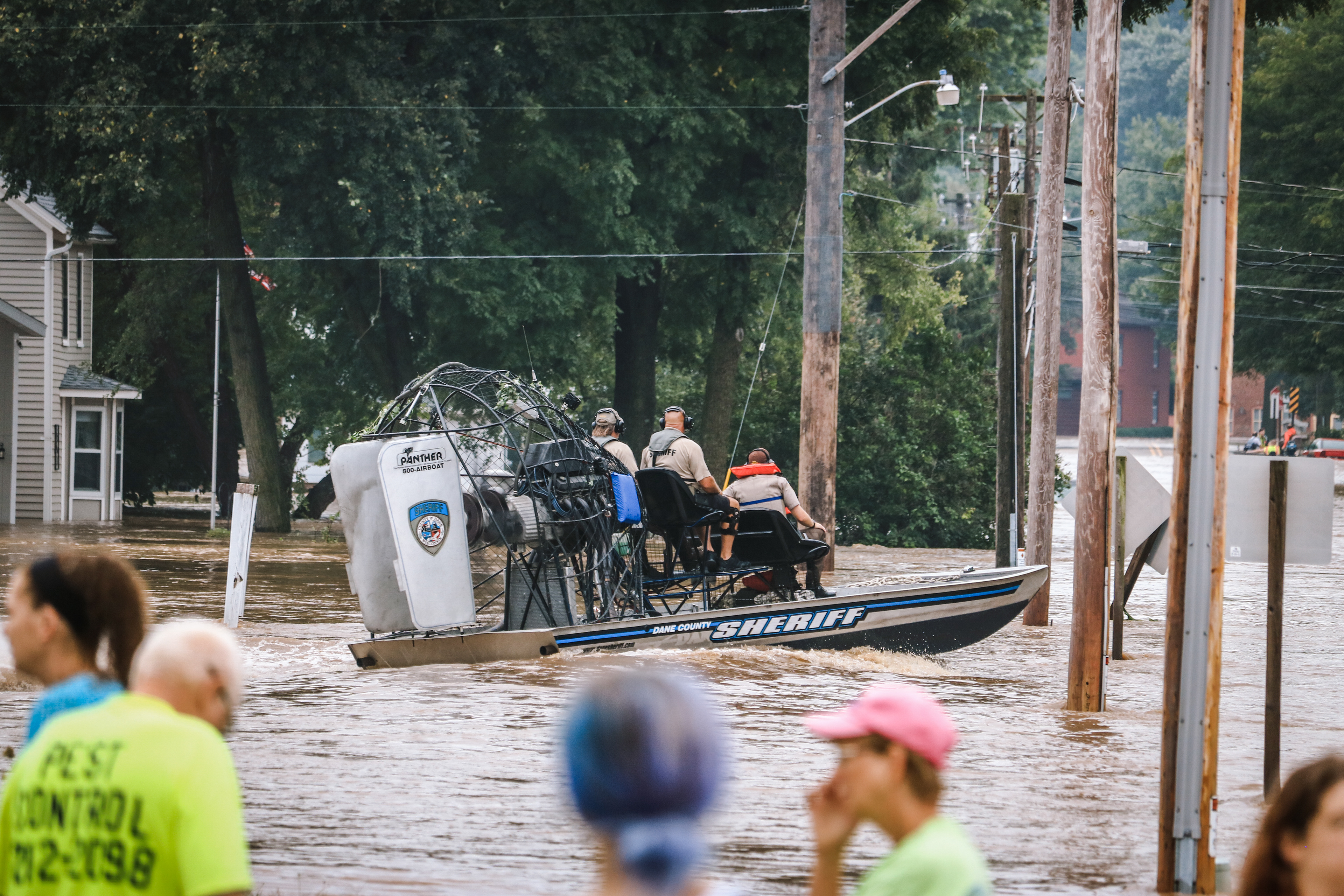 The Dane County Sheriffs air boat rescues residents from their home in the early morning of August 21, 2018.