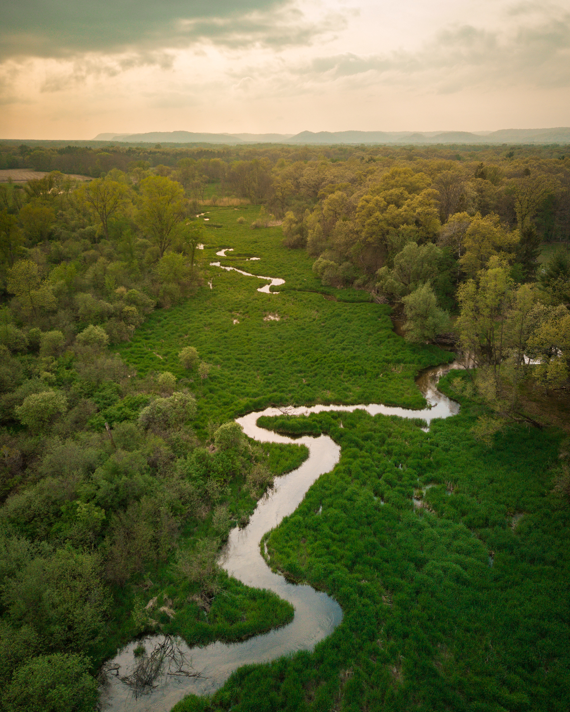 Marsh Creek flows quietly through a valley outside Mazomanie, Wisconsin.