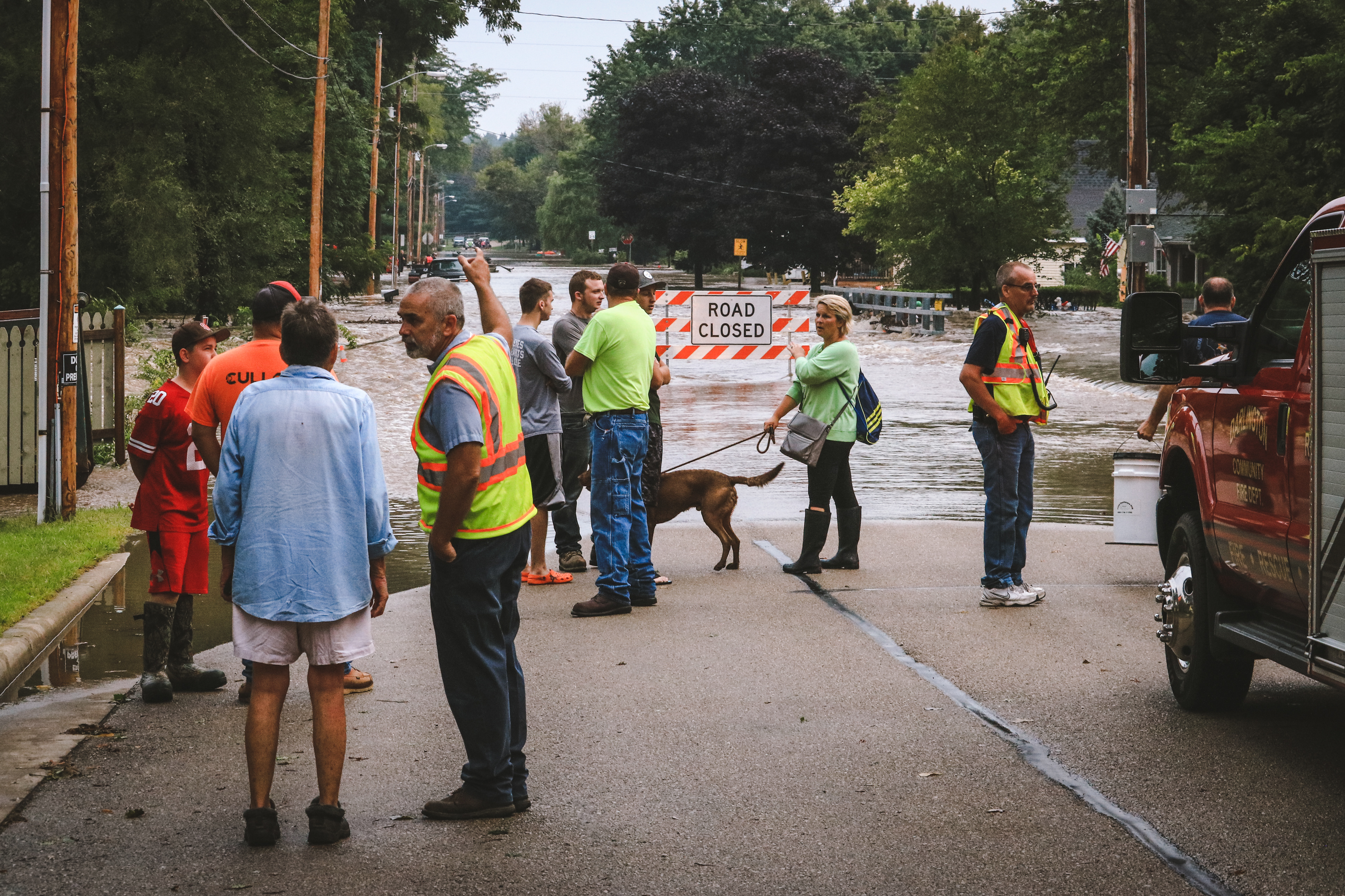 Homeowners watch their neighborhood become overtaken by water on Bridge Street.