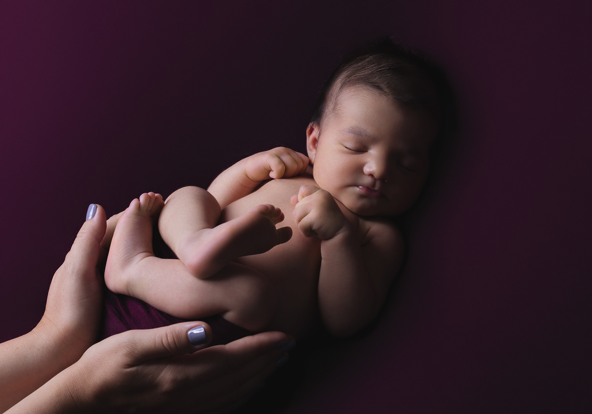 Baby Rita in mommy's hands