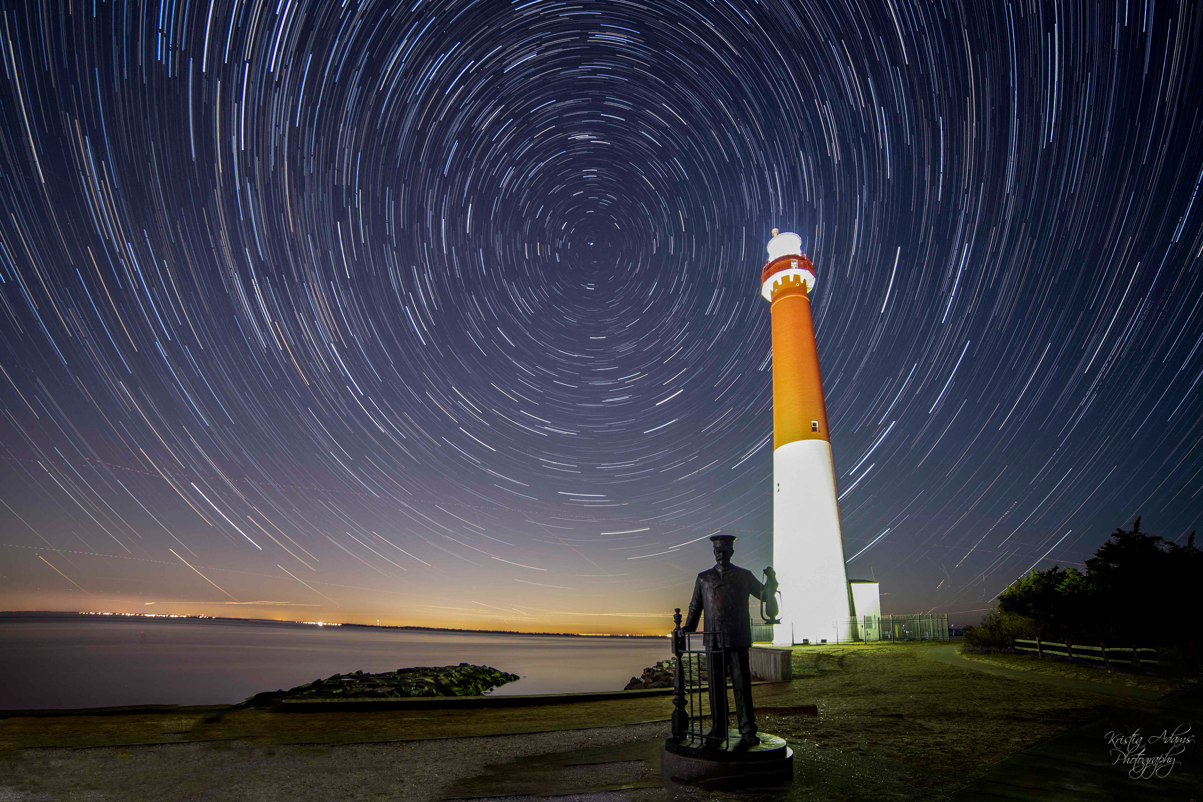 Star trails are captured over the Barnegat Lighthouse at the New Jersey shore. This image is 200 images stacked together to show how the Earth rotates around the stars each night.