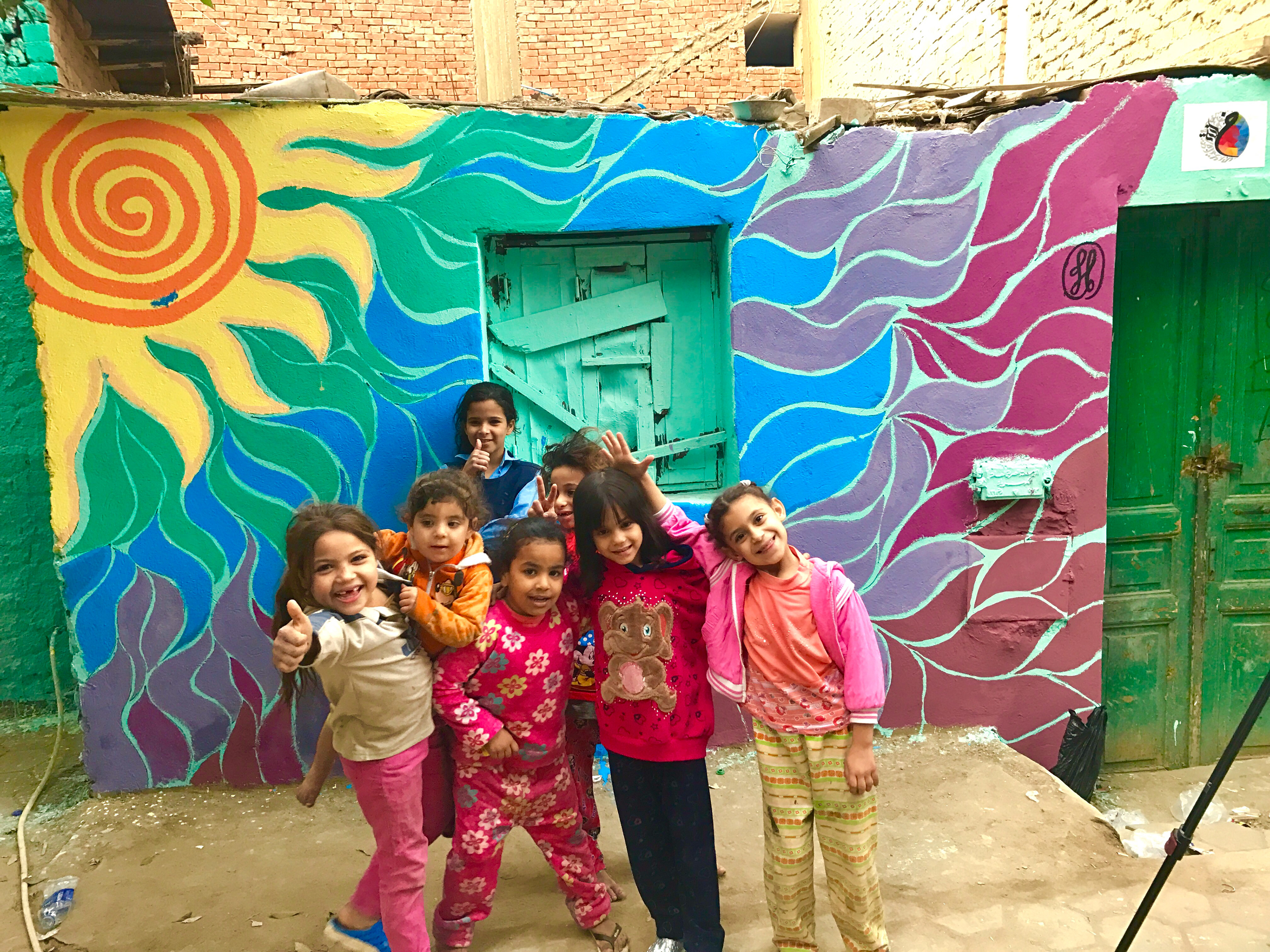 Community Service: Painting murals & houses in poverty-stricken area