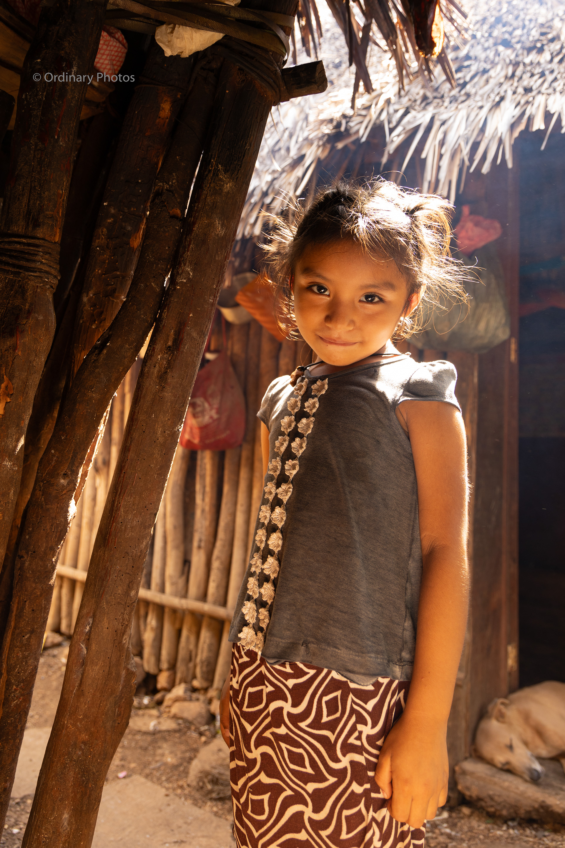 A curious young girl in Maya village Ek Balam