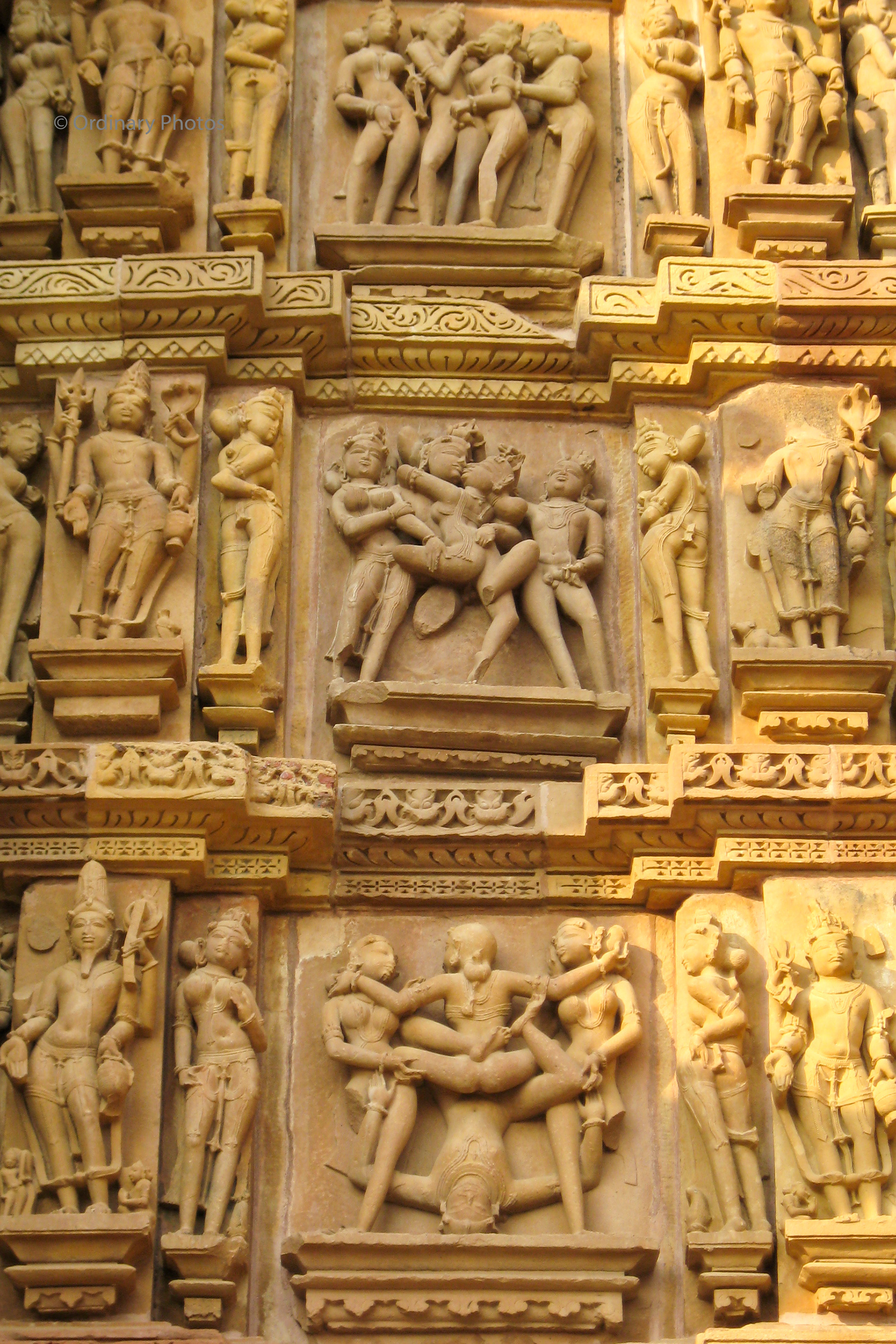 Kama sutra sculptures carved in the temples of Khajuraho
