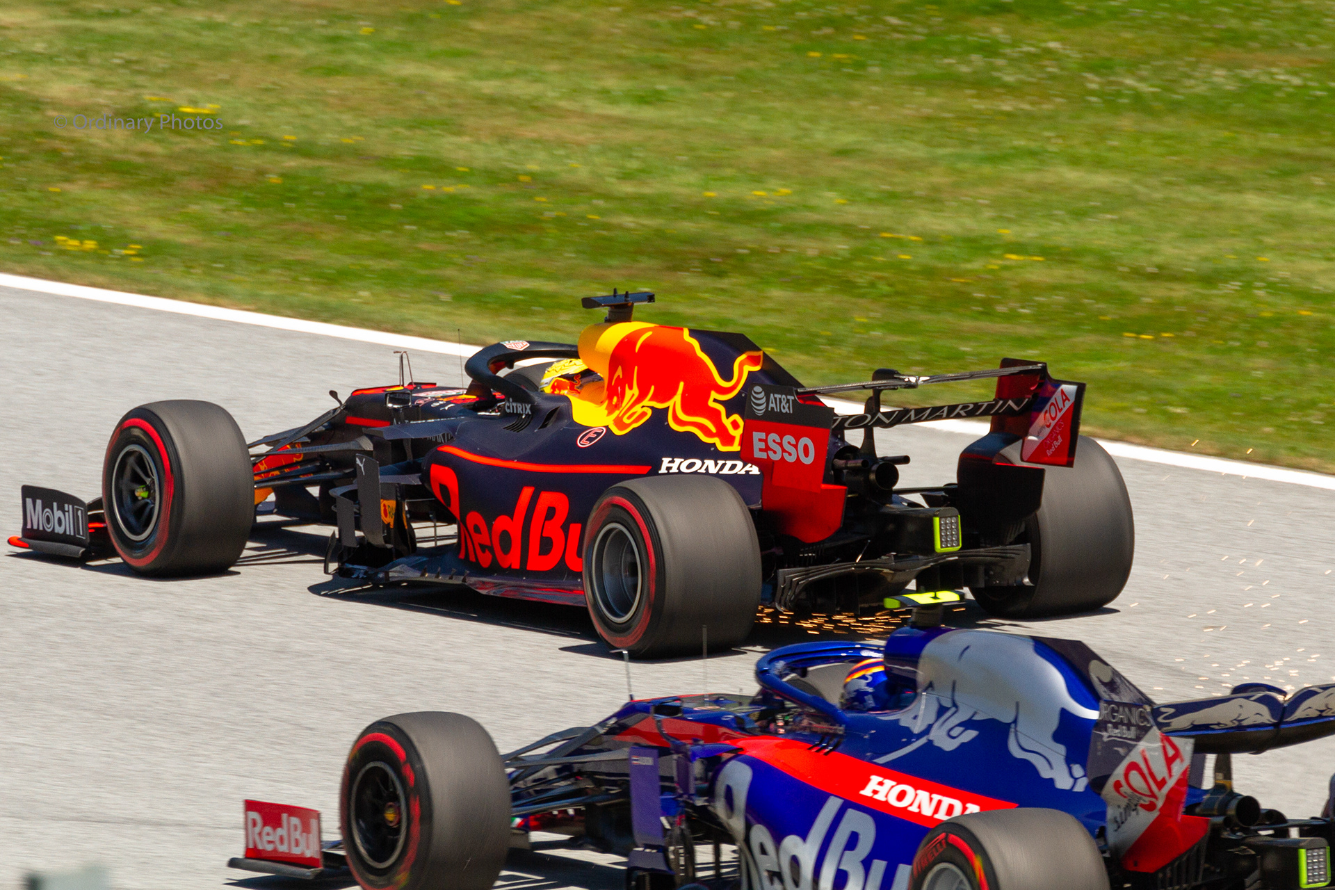 Max Verstappen in his Red Bull together with Alex Albon in the Toro Rosso on the circuit in Spielberg in 2019