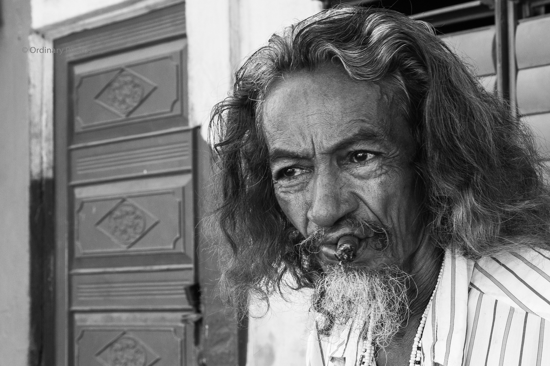 The black and white portrait of a man in Trinidad
