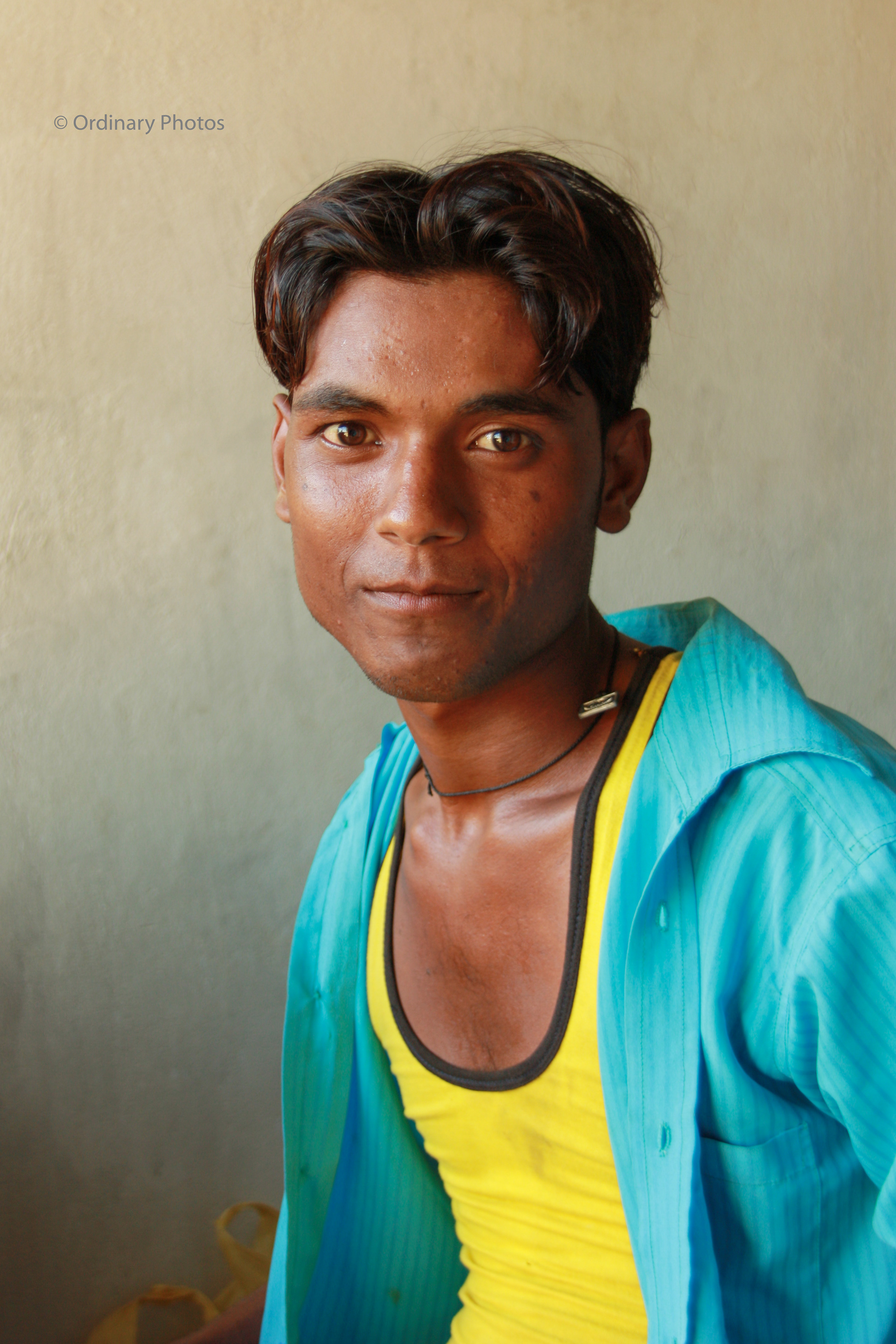 Portrait of a guy in an electricity shop in Lumbini
