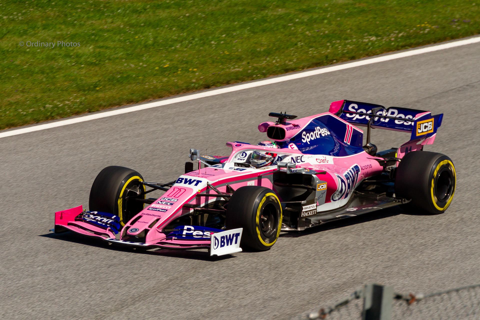 Checo Perez in the pink Racing Point RP19 in Austria 2019