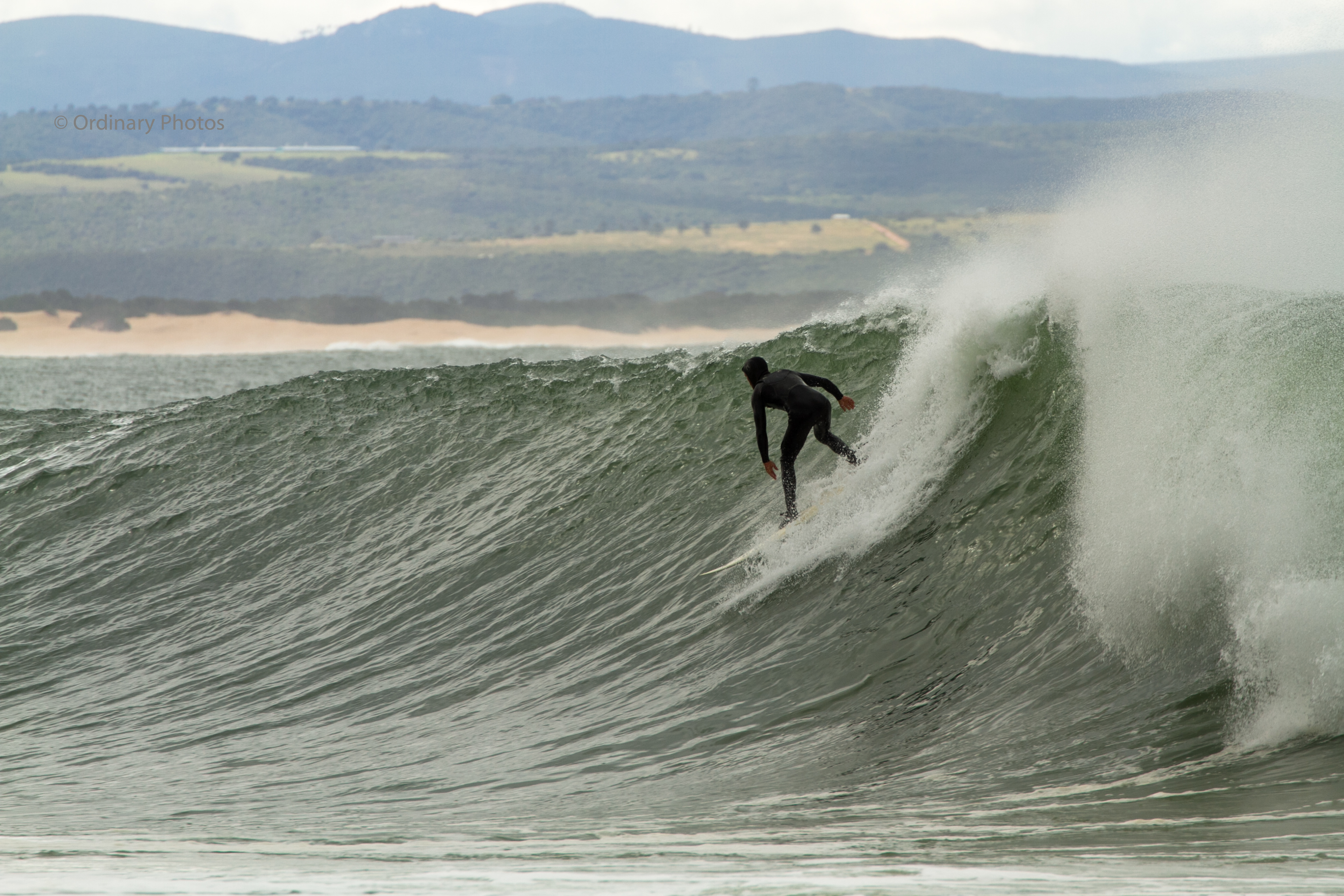 Surfing a wave in Jeffrey's Bay