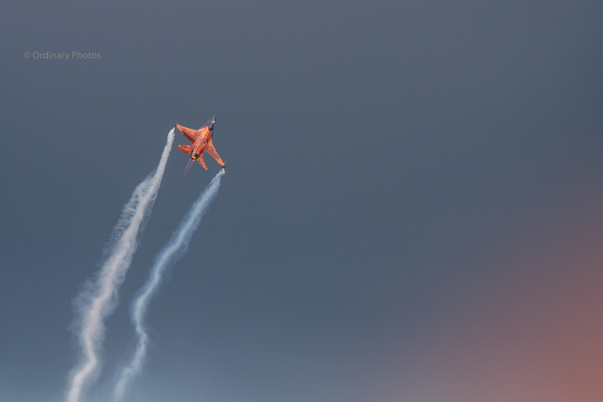The orange F-16 (J-015) of the Solo Display Team during the Dutch air force days 2013 at Vliegbasis Volkel
