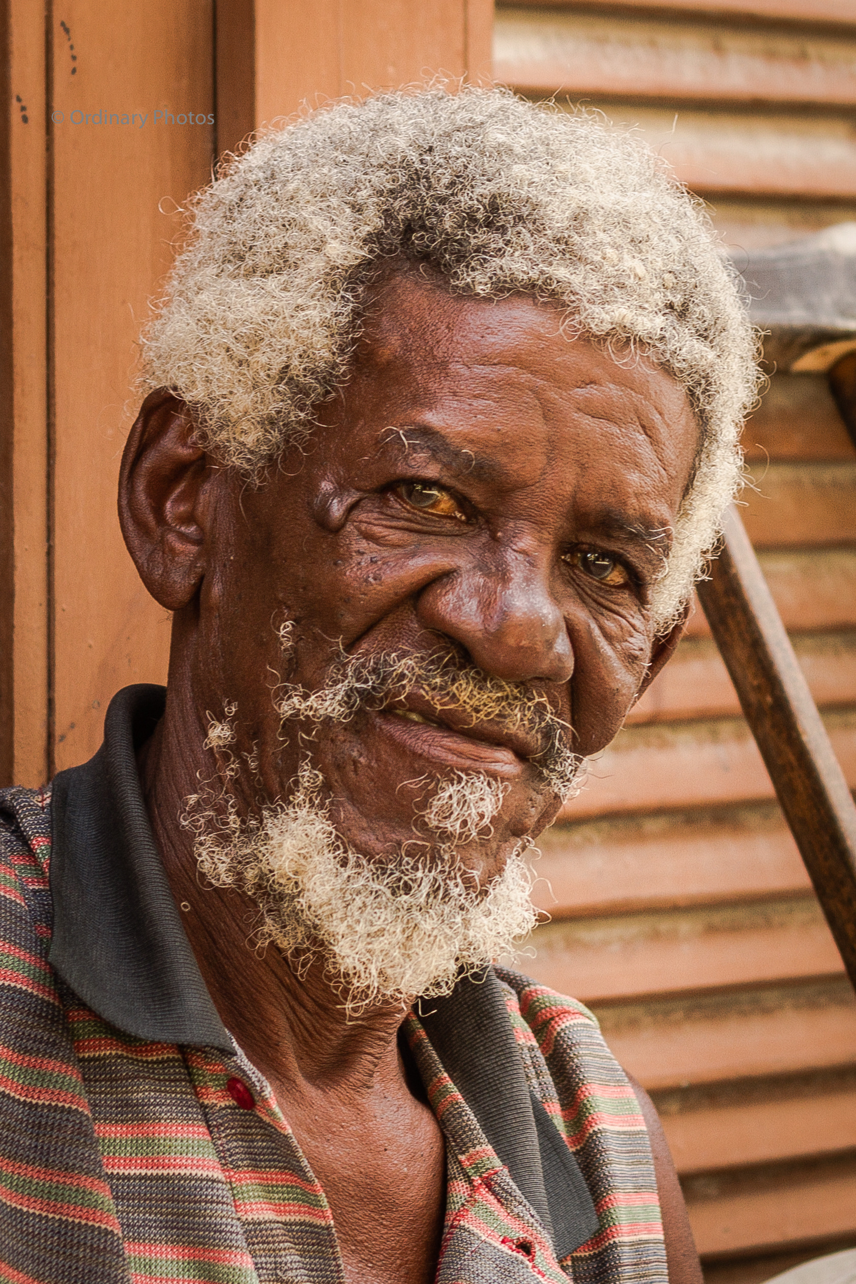A portrait shot of a man in the streets of Havana