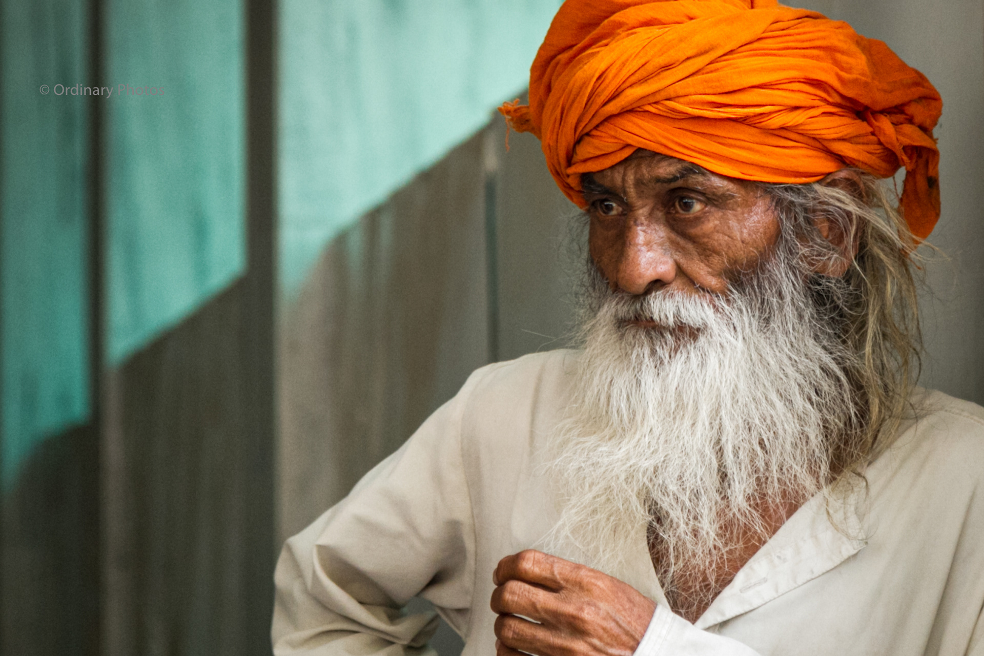 A colorful portrait of a man in a Sikh temple in Nashik