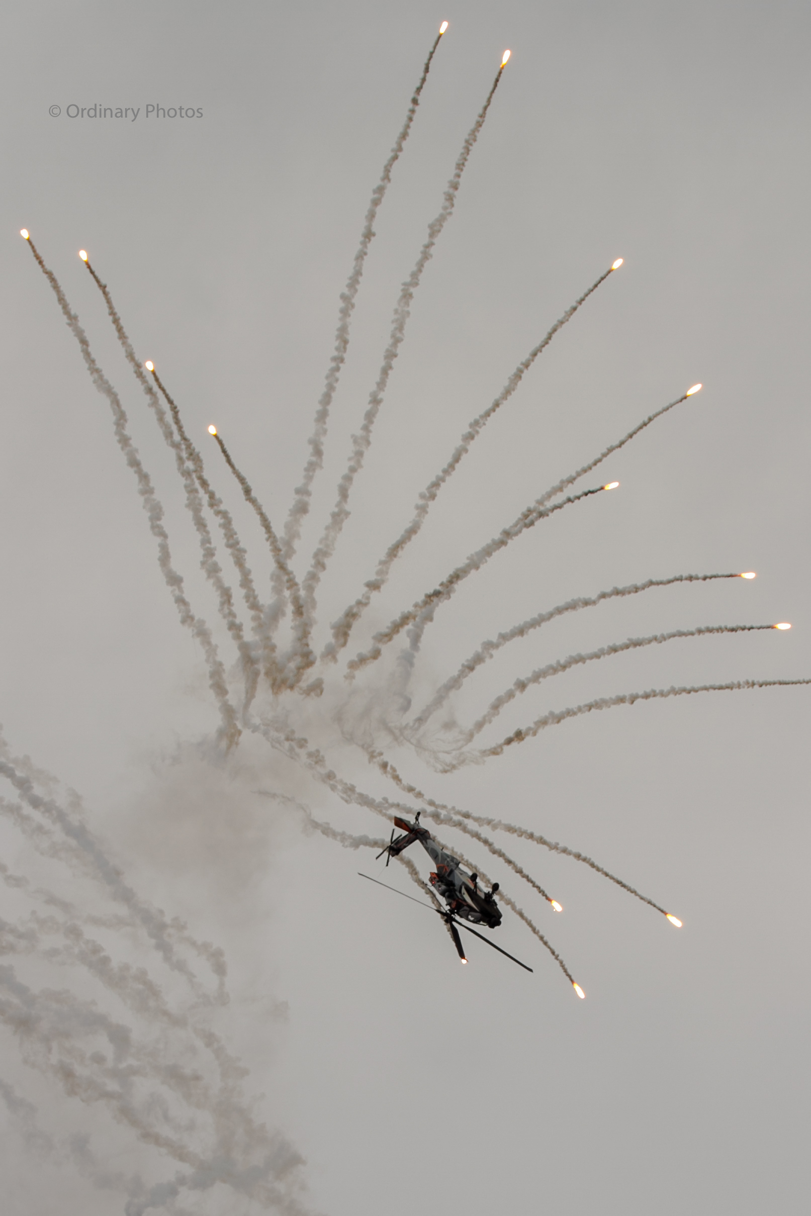 The Apache Solo Display Team releasing flares during the Luchtmachtdagen 2014 at Vliegbasis Gilze-Rijen