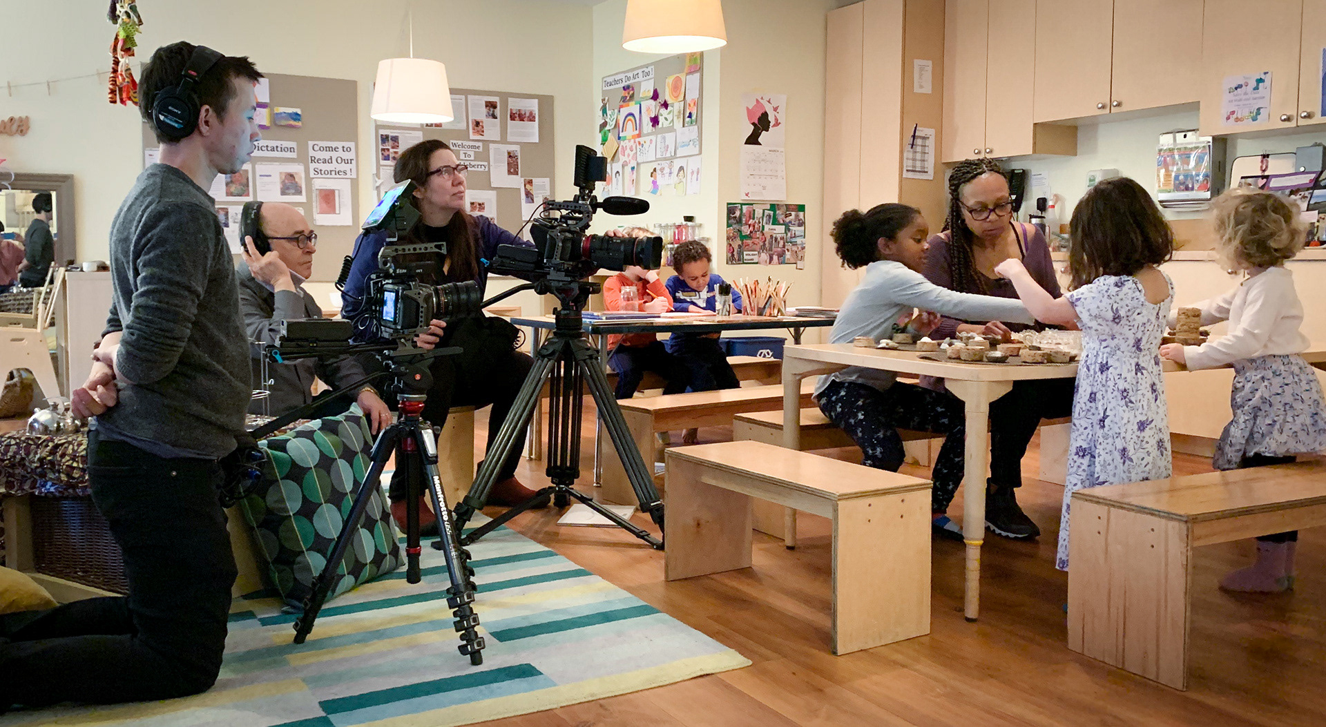 Filming for Reflecting on Anti-Bias Education in Action: The Early Years took place in Seattle, WA and San Francisco/CA. Shown here is Seattle-based teacher Joyce Jackson working with her students and film crew (from left to right): Jonah Kozlowski, John Nimmo, Filiz Efe McKinney. Photo courtesy of Debbie LeeKeenan.