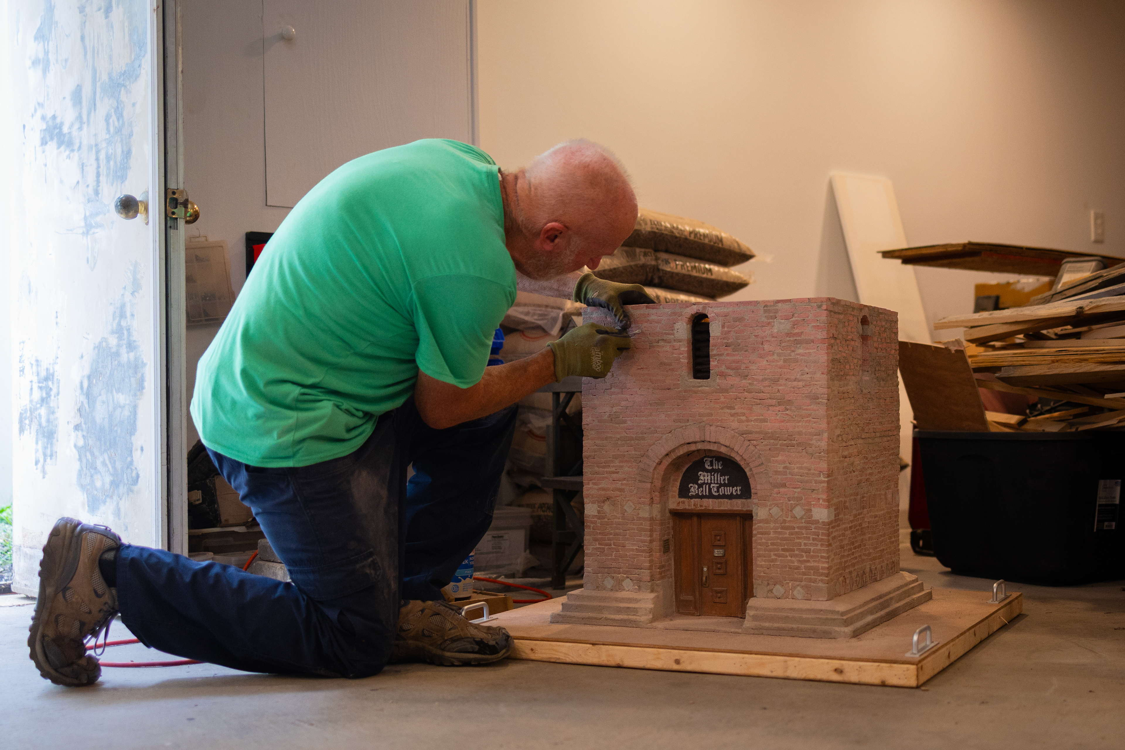Teets adds with finishing touches to the first of four sections of the Bell Tower. Each section will weigh approximately 150-pounds