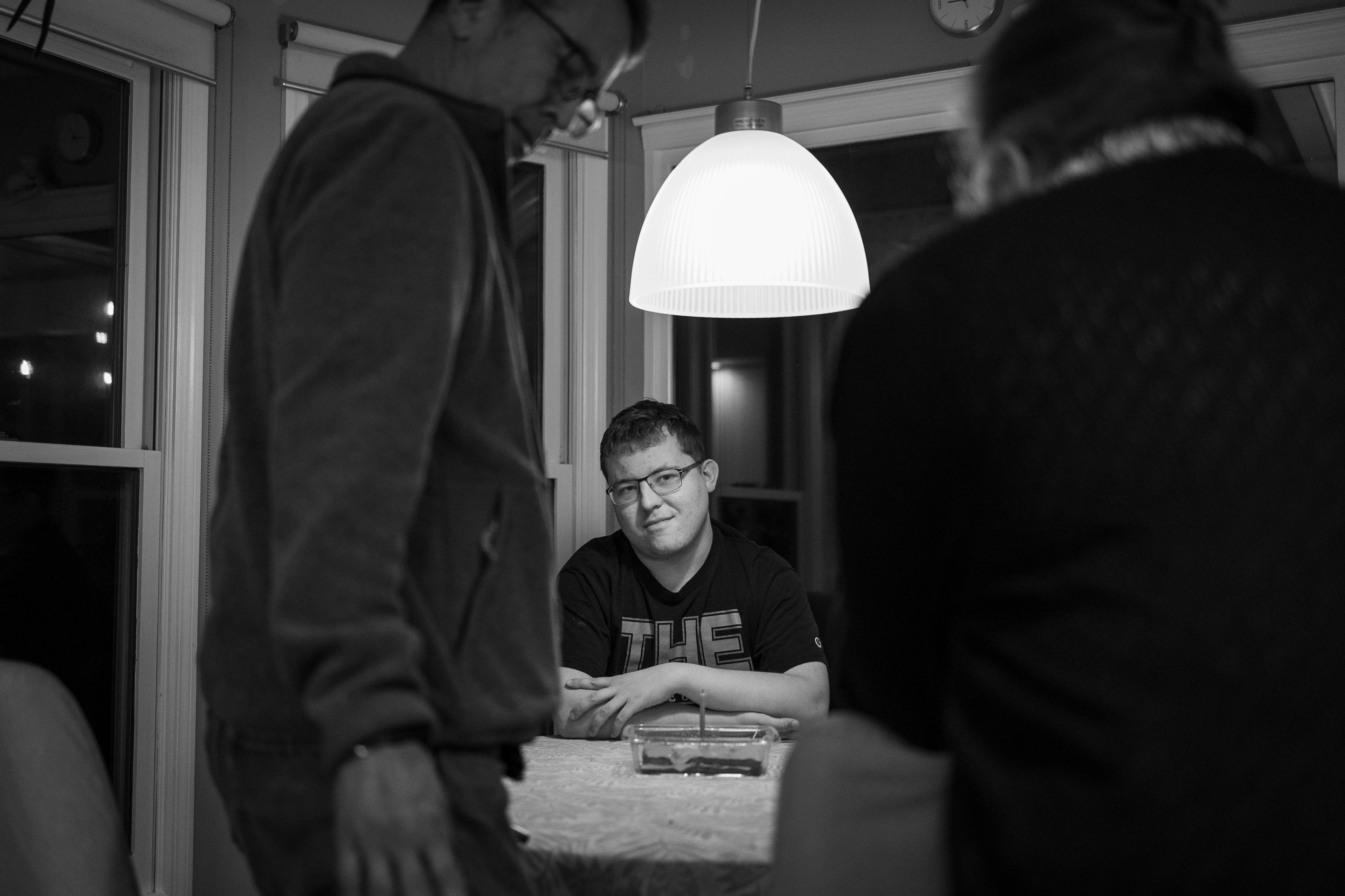 After being sung "Happy Birthday" and blowing out the candle on his favorite dessert, tiramisu, Evan smiles up at his mother, Kimberly Koloski on Wednesday, November 19, 2025