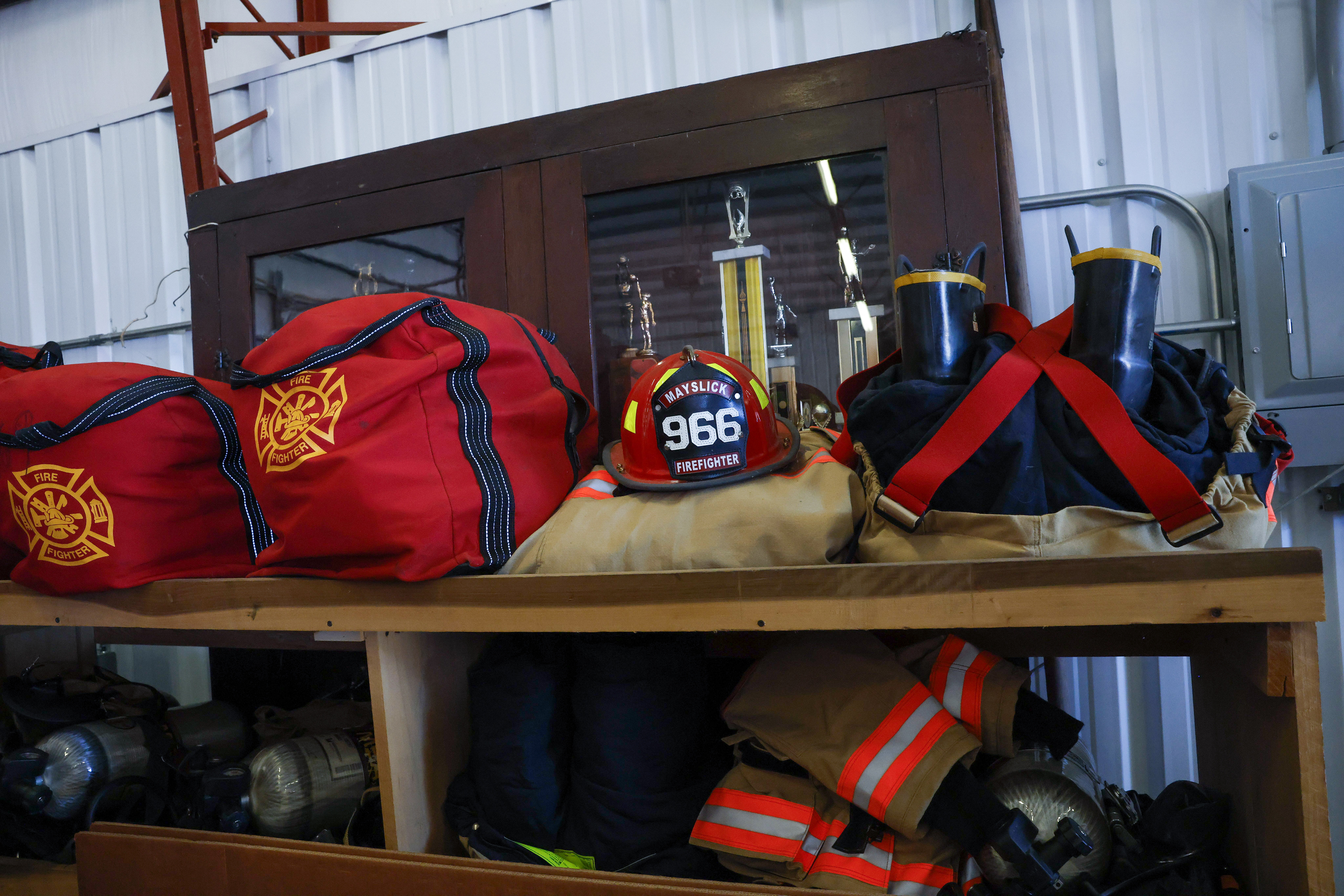  Gear for the May’s Lick fire department volunteers is packed and ready to go when the need arises. Most of the firefighters have other jobs, many related to farming.
