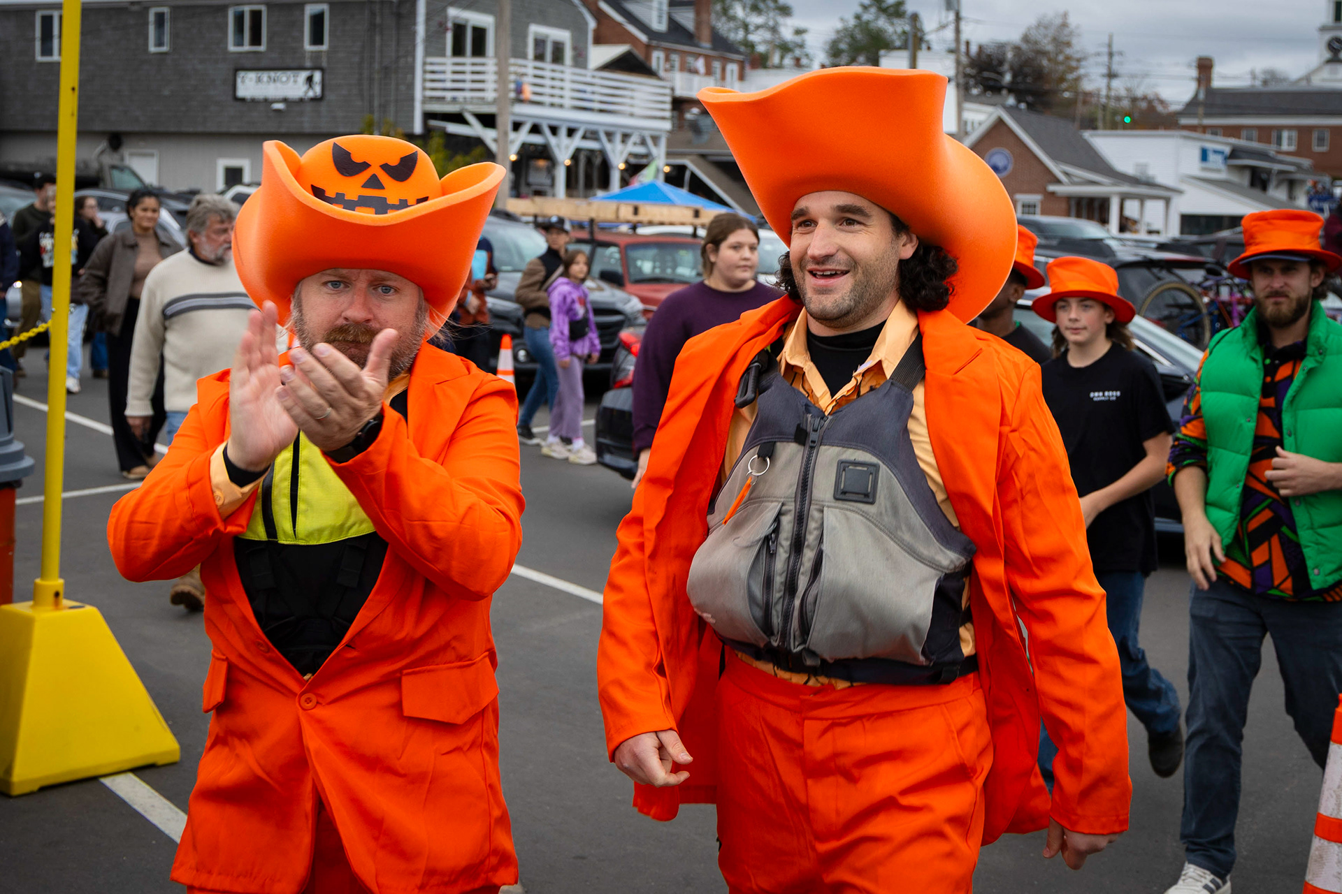 Two participants of the regatta make their way to the dock ahead of the race.
