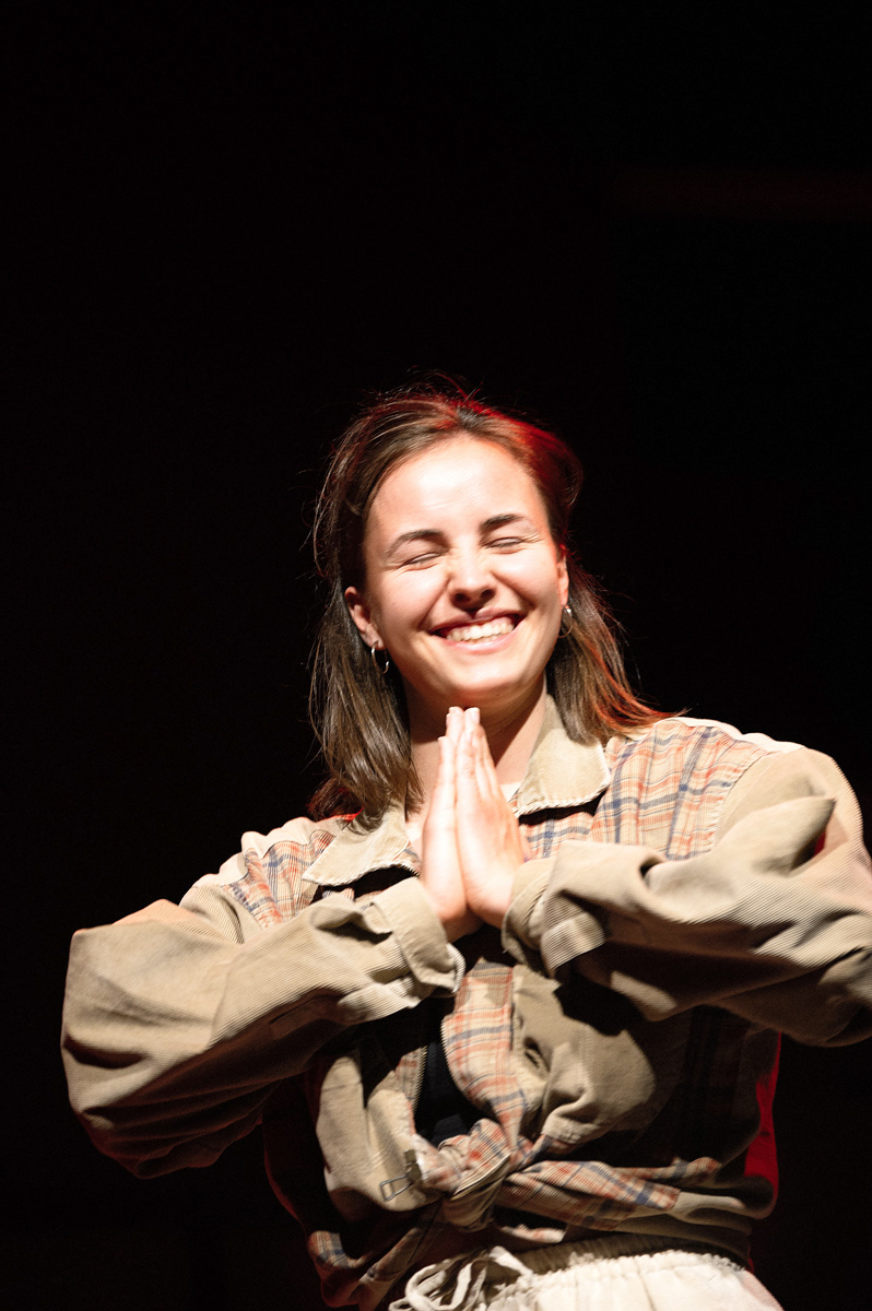 artist saying thank you hands together