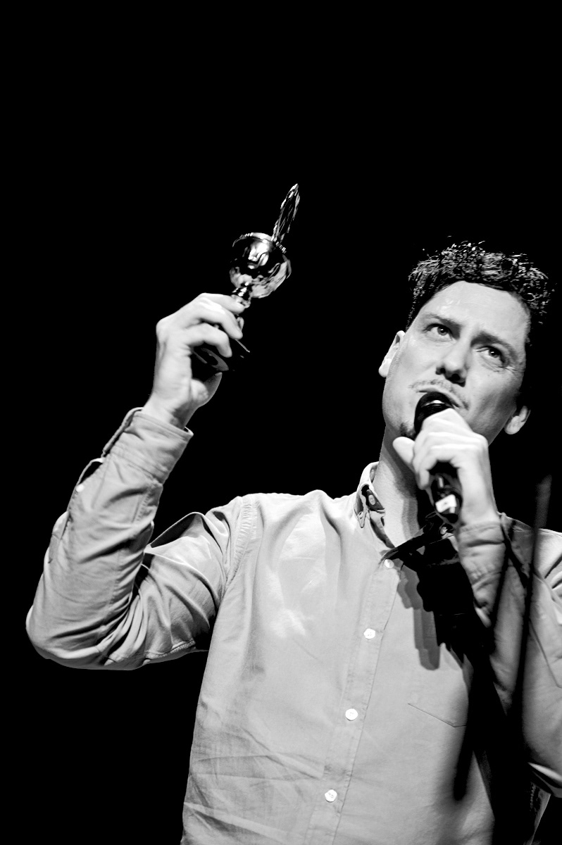 entertainer and comedian david friedrich holding a trophy