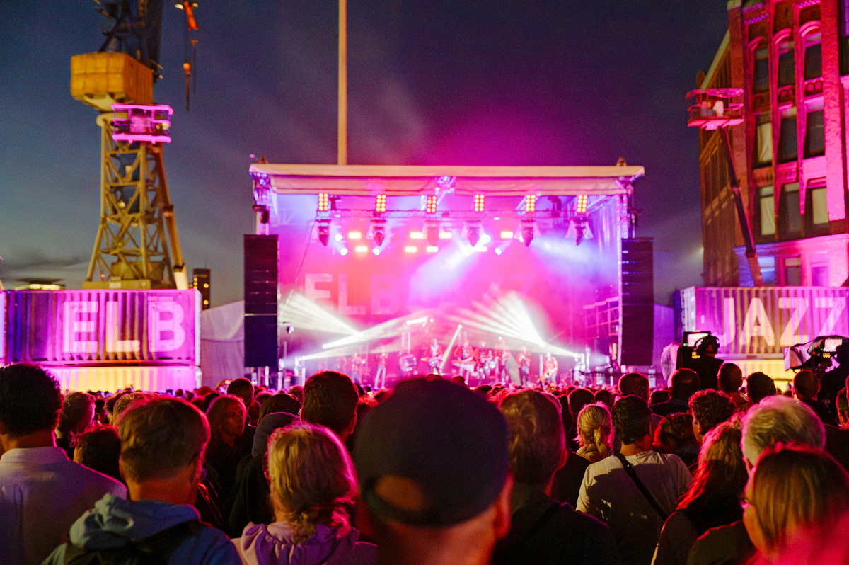 conert stage with audiance from behind. its a night shot at elbjazz festival, hamburg