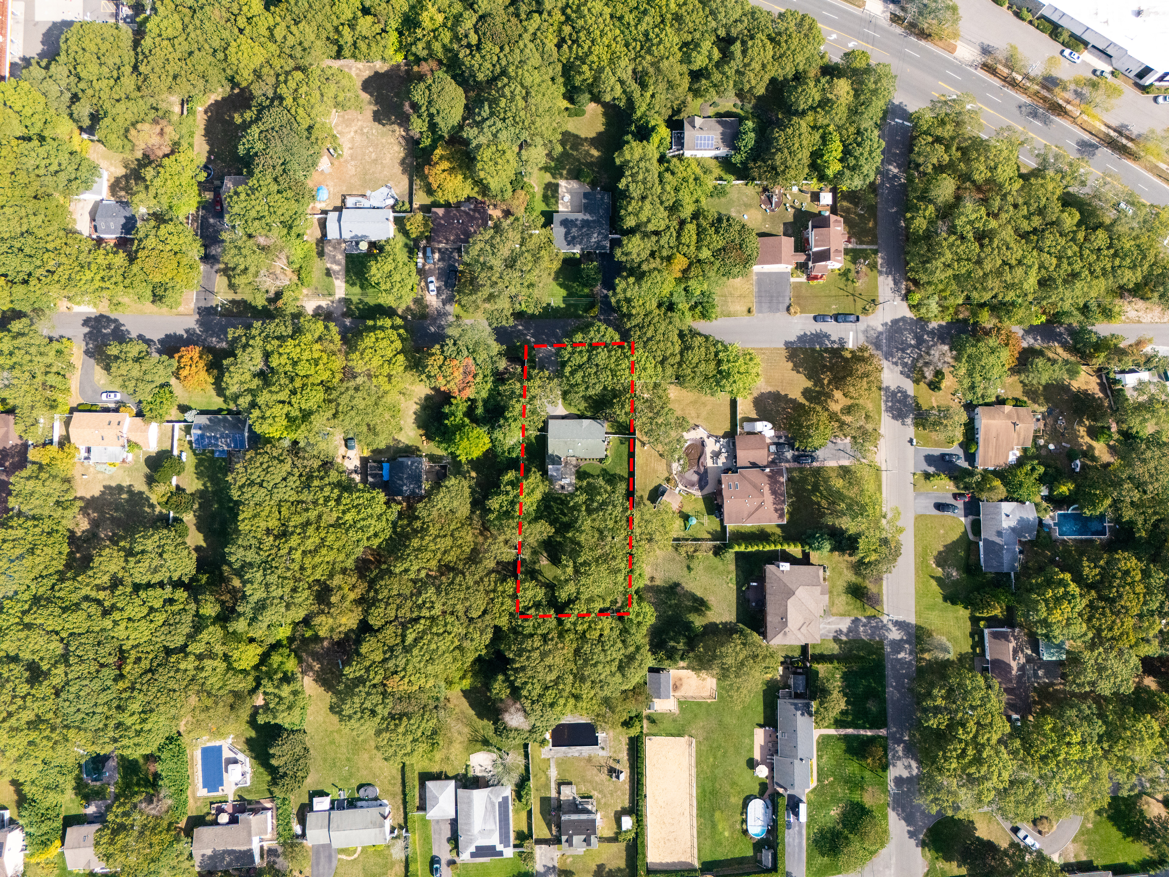 Aerial with property line visualized.