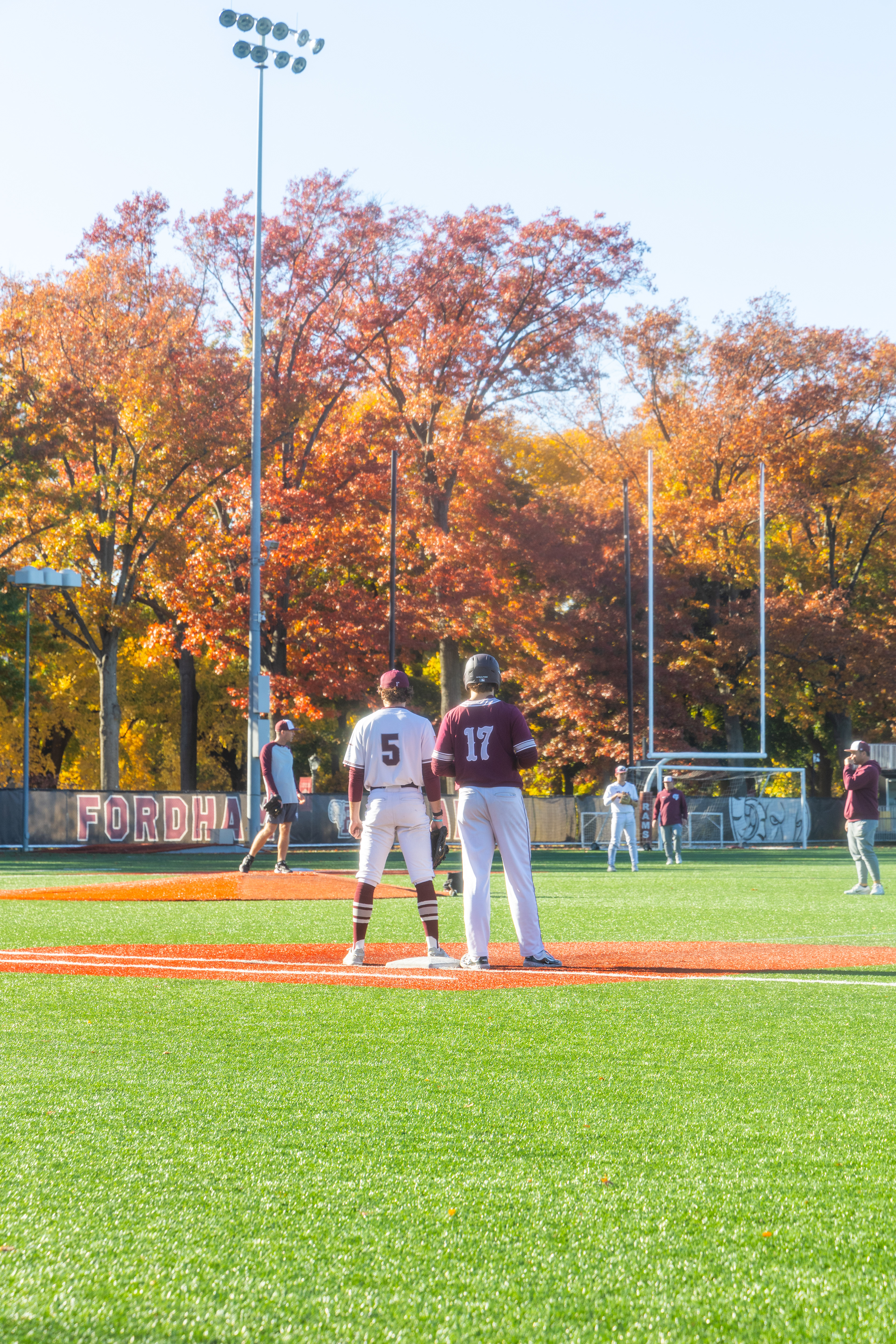 Players waiting for the ball to go into play.