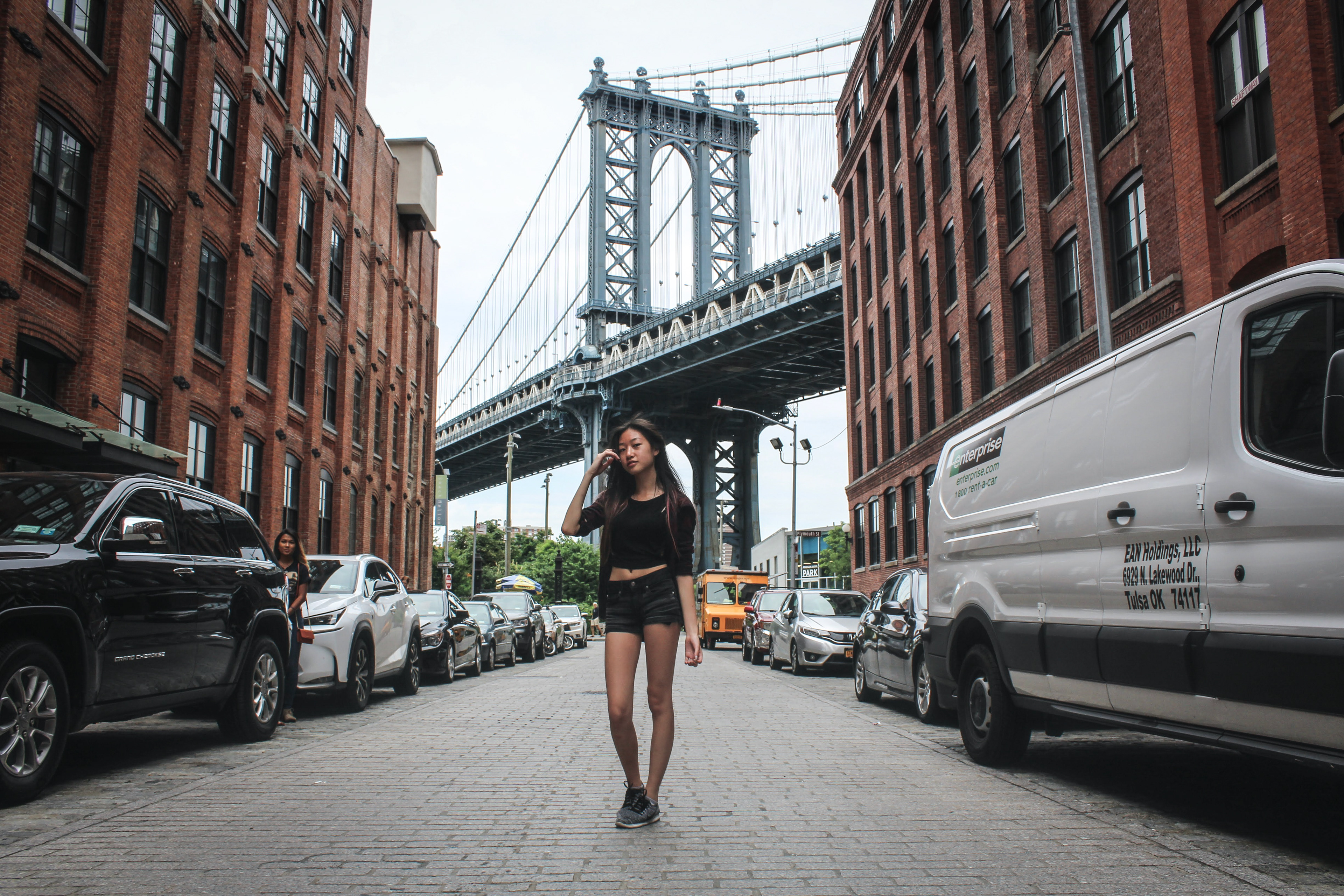Amily in front of the Manhattan Bridge.