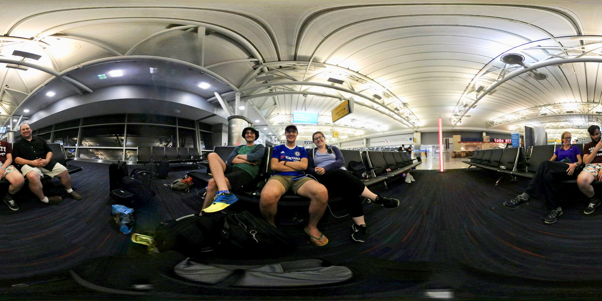 Brytan, Caio, and Emily waiting at JFK to fly on the redeye to Guayaquil, ECUADOR