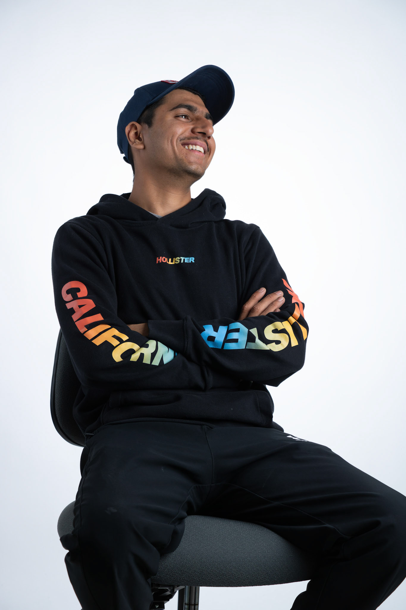 Anterleen Singh, 21, a SAIT photojournalism student, poses for a portrait in a studio in the Senator Burns Building at SAIT in Calgary on Monday, May 27, 2024. Anterleen, originally from Amritsar, Punjab, landed in Canada in December 2022 to achieve his career goals. He loves going on hikes. (Photo by Armaan Khanna/SAIT)