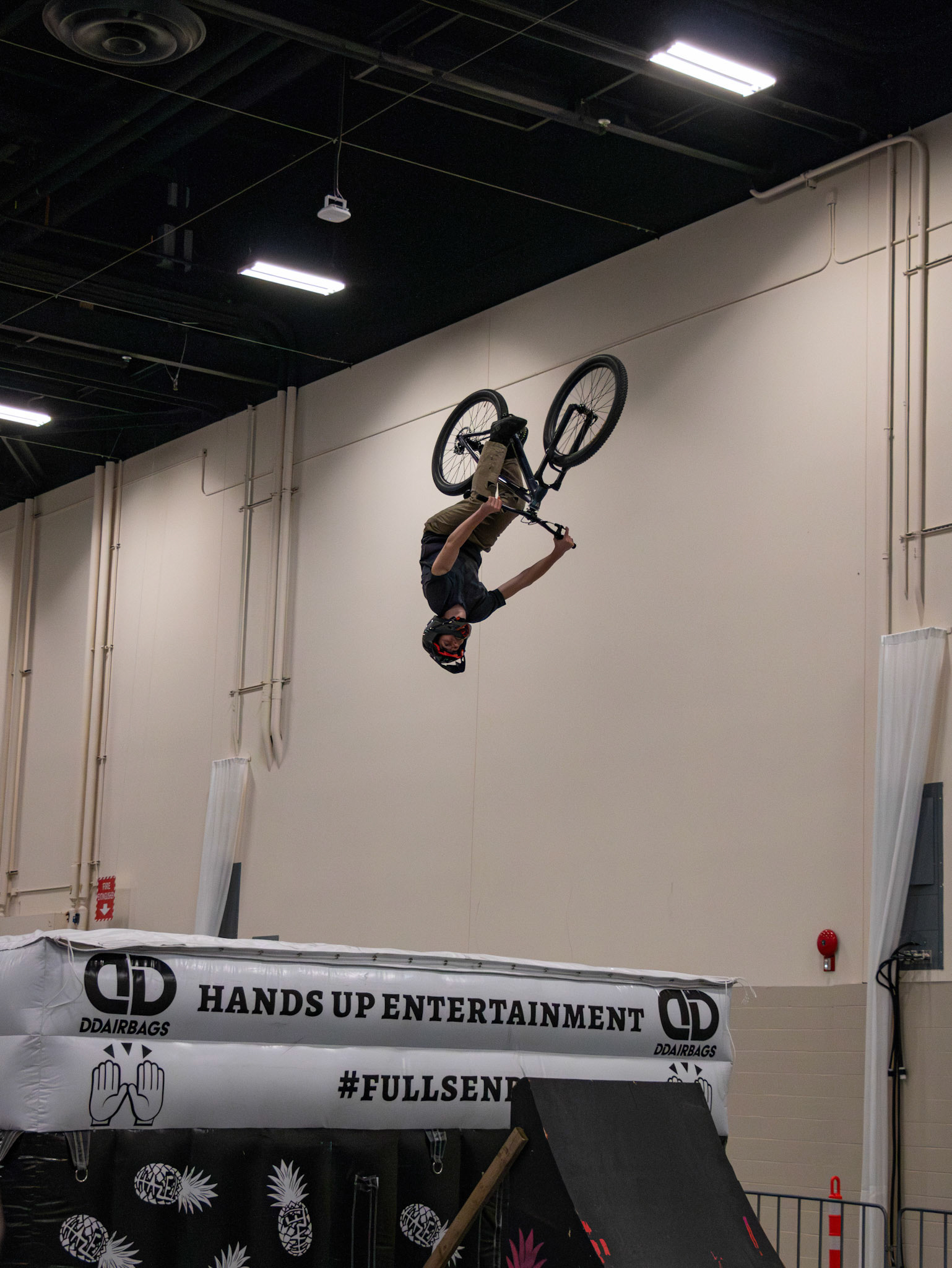 Professional bikers showcase thrilling stunts and tricks on the jump ramp at the Alberta Bike Show at BMO Centre, Calgary on Sunday, March 17, 2024. The Alberta Bike Show provides an incredible experience for cyclists and provides an opportunity to explore the latest bikes. (Photo by Armaan Khanna/The Press)