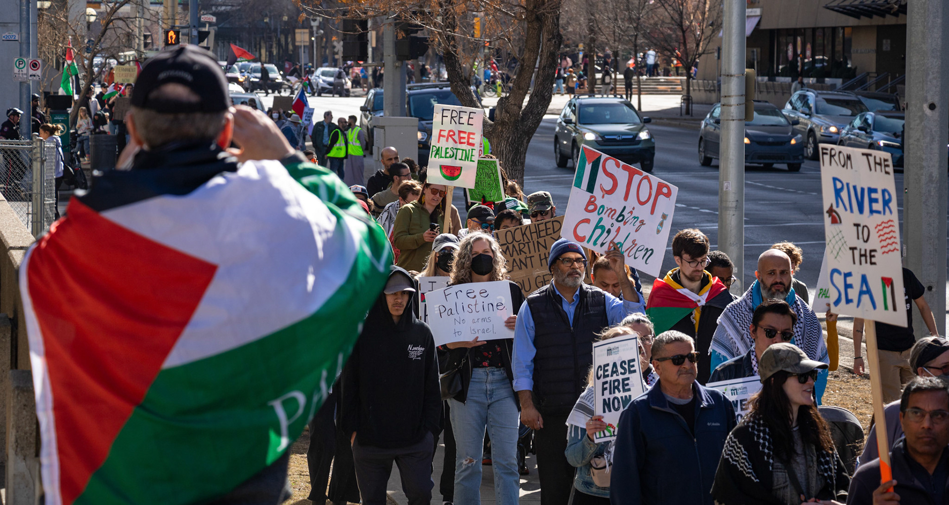 People participate in the Pro-Pelastine protest which took place outside of the City Hall, Calgary on Sunday, March 17, 2024. The group “Justice for Palestine” is holding an organized and peaceful protest frequently in Calgary downtown to express their angriness and show their solidarity with Palestine. (Photo by Armaan Khanna/The Press)