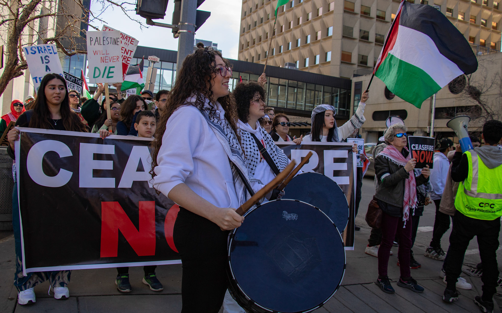 People participate in the Pro-Pelastine protest which took place outside of the City Hall, Calgary on Sunday, March 17, 2024. The group “Justice for Palestine” is holding an organized and peaceful protest frequently in Calgary downtown to express their angriness and show their solidarity with Palestine. (Photo by Armaan Khanna/The Press)