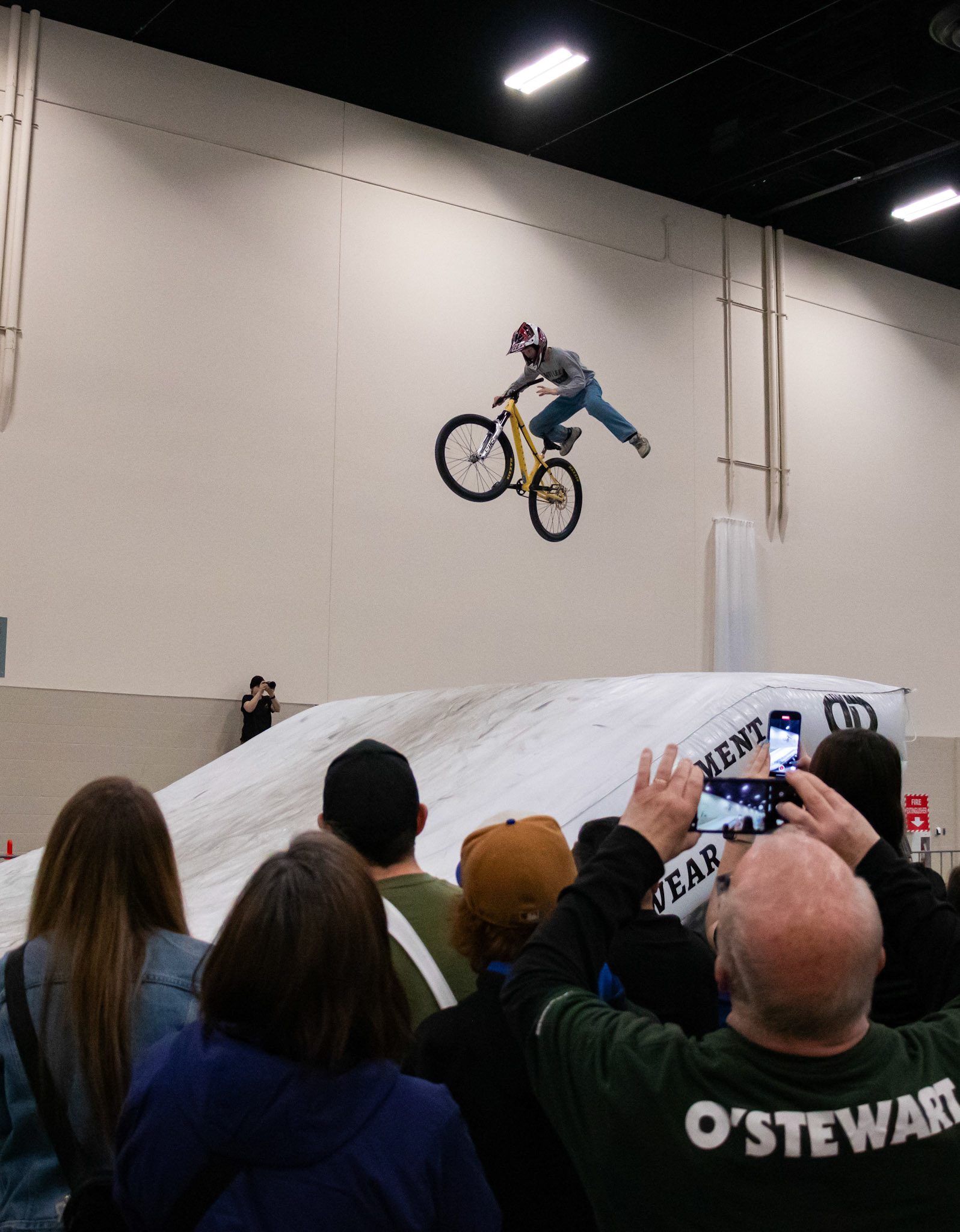 Professional bikers showcase thrilling stunts and tricks on the jump ramp at the Alberta Bike Show at BMO Centre, Calgary on Sunday, March 17, 2024. The Alberta Bike Show provides an incredible experience for cyclists and provides an opportunity to explore the latest bikes. (Photo by Armaan Khanna/The Press)