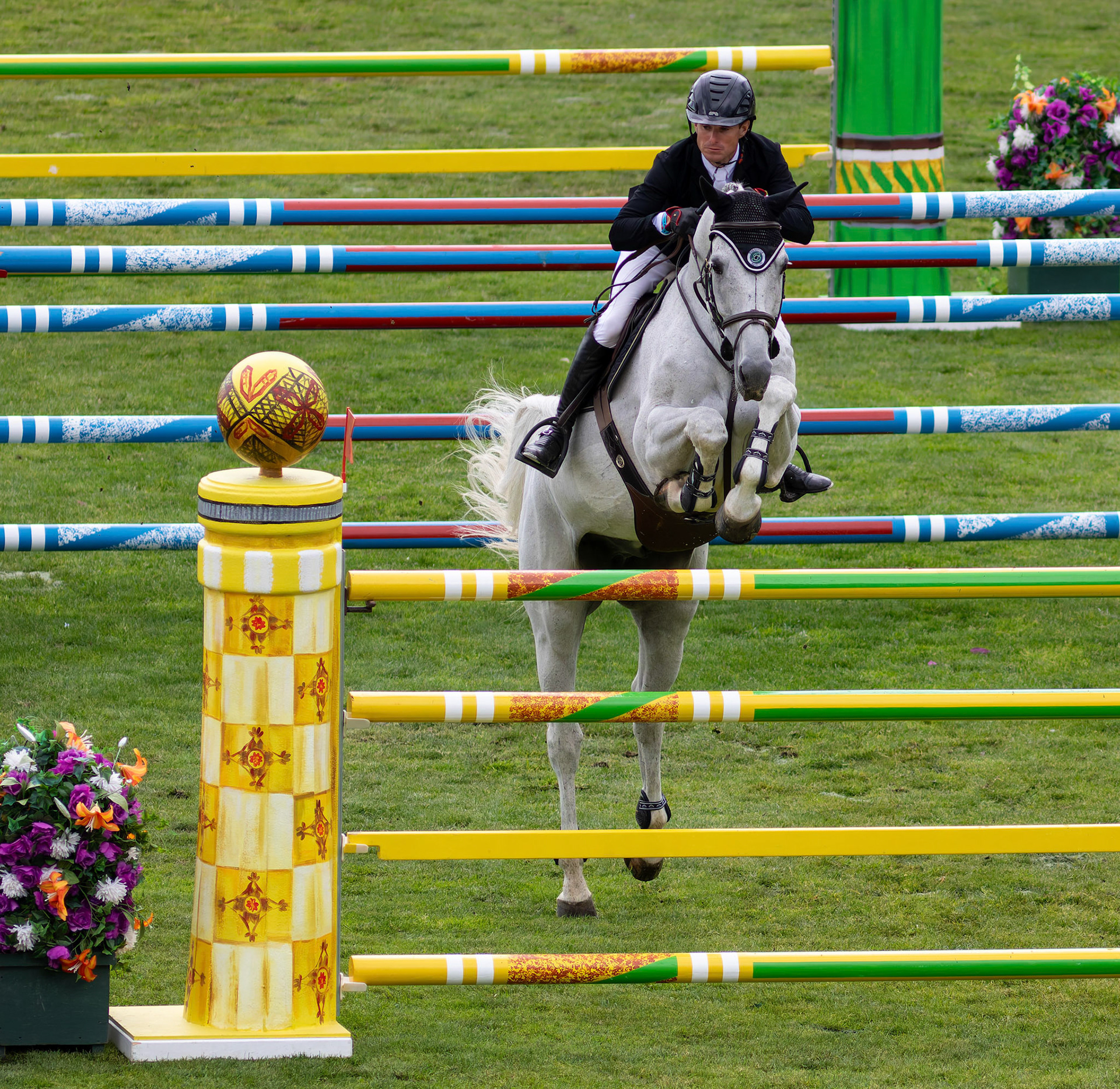 Kyle Timm of Canada competes on Casino Calvin in the 445 – RBC Grand Prix of Canada, presented by Rolex – 1.60m event at the International Ring in Spruce Meadows, SW Calgary, on Saturday, June 15, 2024. Spruce Meadows is renowned for hosting top-tier equestrian competitions, such as the 'National' tournament, held from June 12 to 16, 2024. (Photo by Armaan Khanna/SAIT)