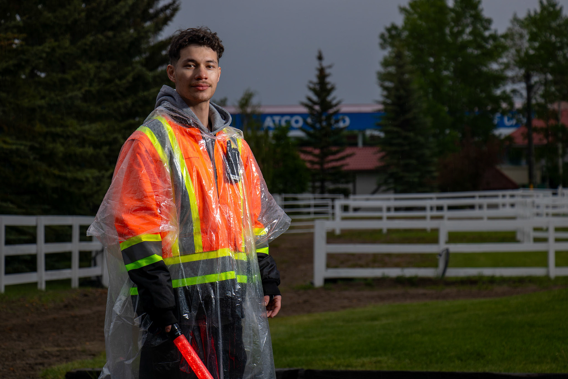 Elkin Perdono, age 25, studied Network Systems Specialist at SAIT and now works part-time. Portrait taken in a parking lot at Spruce Meadows, SW Calgary, on Saturday, June 15, 2024. Spruce Meadows is renowned for hosting top-tier equestrian competitions, such as the 'National' tournament, held from June 12 to 16, 2024. (Photo by Armaan Khanna/SAIT)