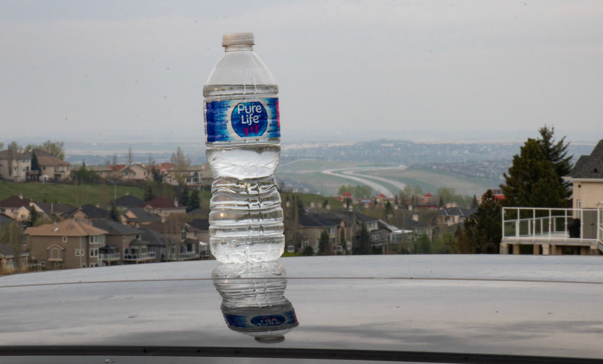 On Friday, May 10, 2024, a ‘Pure Life’ drinking water bottle, purchased on sale at Costco, became the subject of 36 creative photos taken around Calgary. (Photo by Armaan Khanna/SAIT)