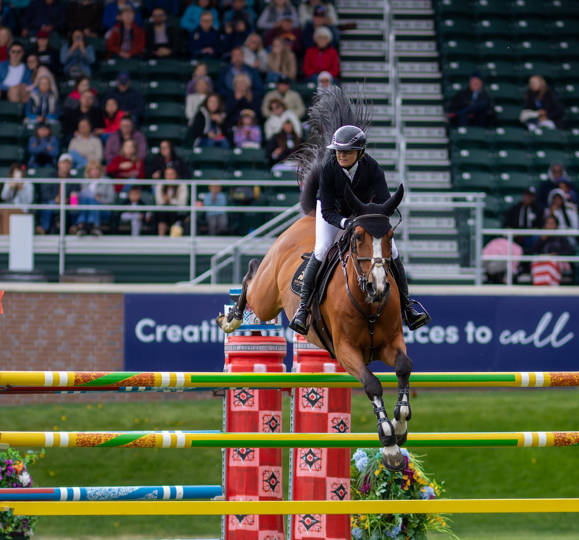 Erynn Ballard of Canada competes on Nikka VD Bisschop in the 445 – RBC Grand Prix of Canada, presented by Rolex – 1.60m event at the International Ring in Spruce Meadows, SW Calgary, on Saturday, June 15, 2024. Spruce Meadows is renowned for hosting top-tier equestrian competitions, such as the 'National' tournament, held from June 12 to 16, 2024. (Photo by Armaan Khanna/SAIT)