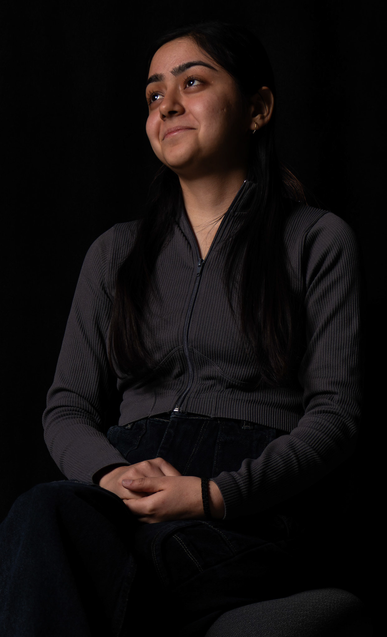 Bipasha Sharma, 21, a student in the ITS program at SAIT, poses for a portrait in a studio at the Senator Burns Building at SAIT in Calgary on Thursday, June 13, 2024. Originally from Haryana, India, Bipasha moved to Canada in April 2023 to pursue her career aspirations. She enjoys singing and watching movies and series online. (Photo by Armaan Khanna/SAIT)