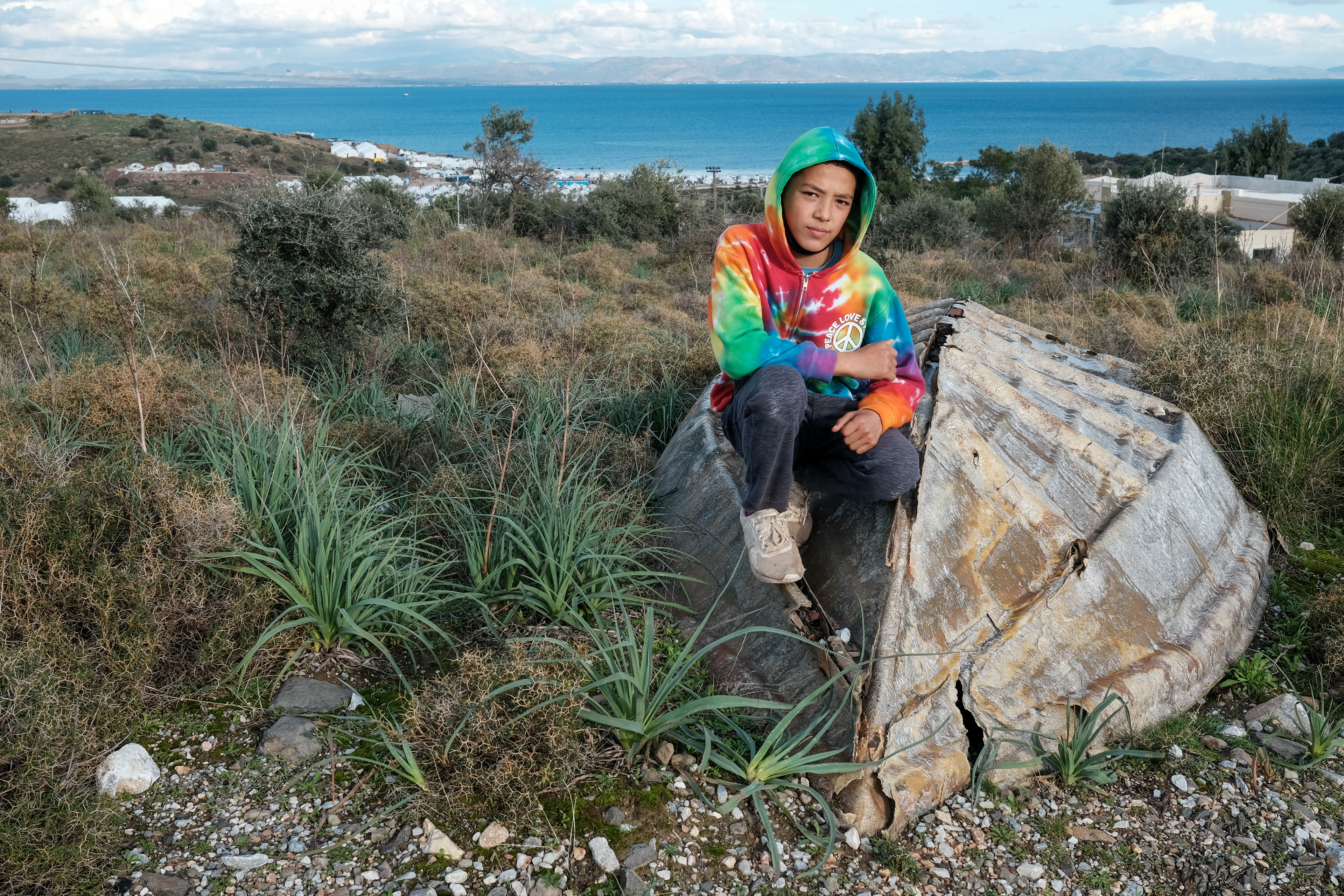 Reza is only 13 years old, when a Greek Police Officer assaulted him. He is alone and unaccompanied
