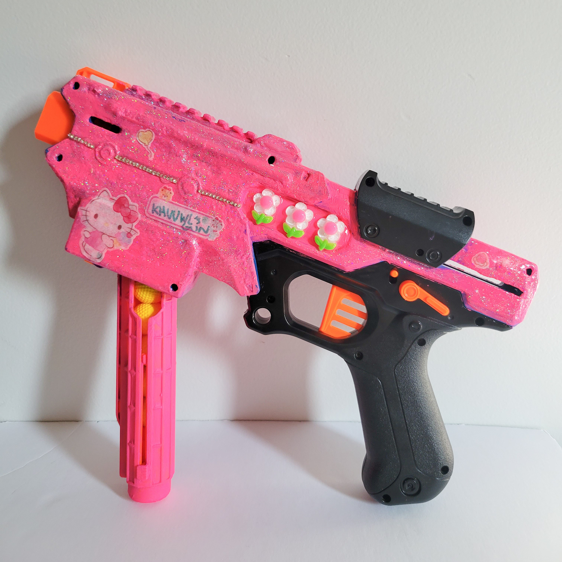 stinger | 12" x 9" | Mixed media on toy gun | 2023 | side 2