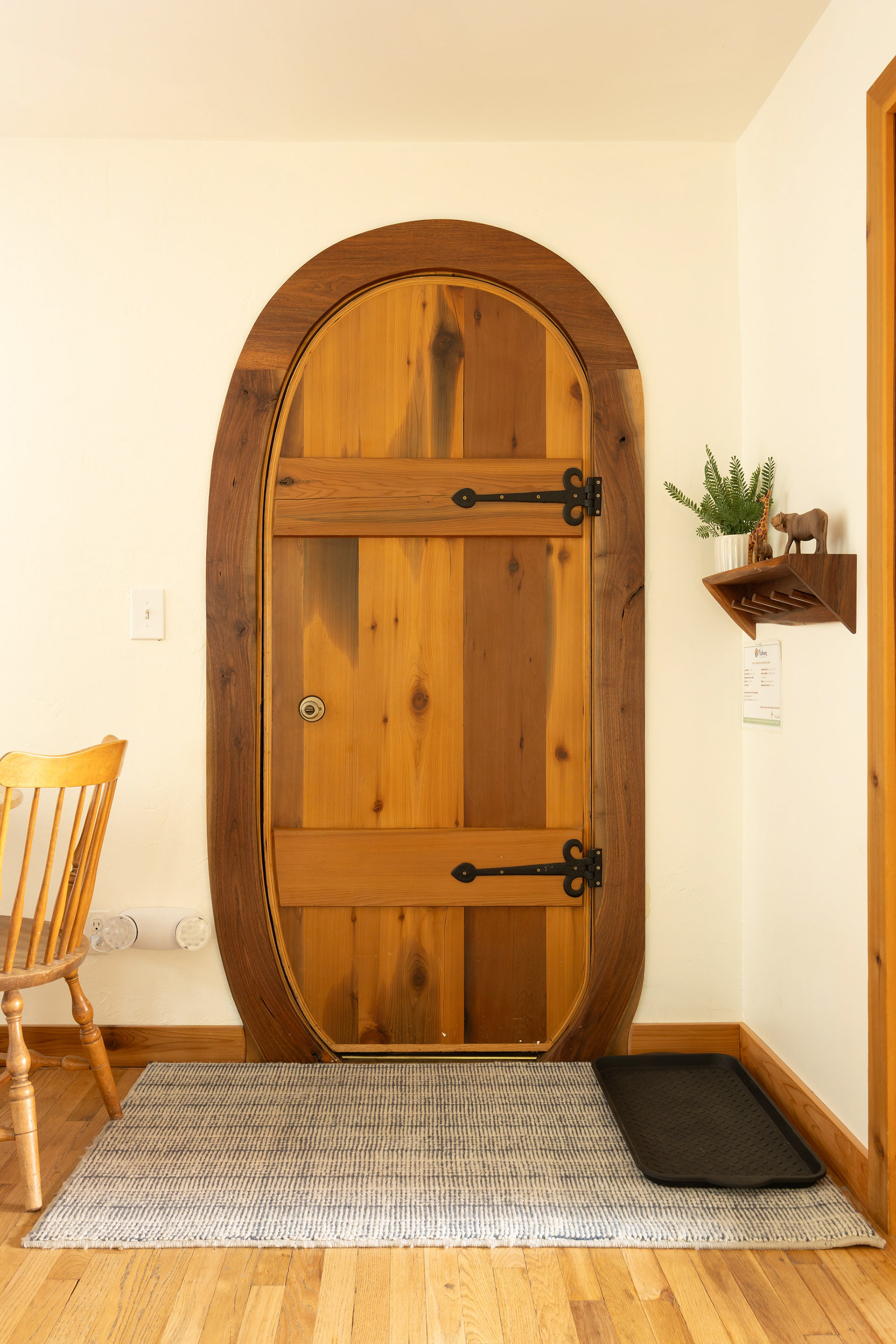 Airbnb listing photo. Door done by Renaissance Fine Woodworking.