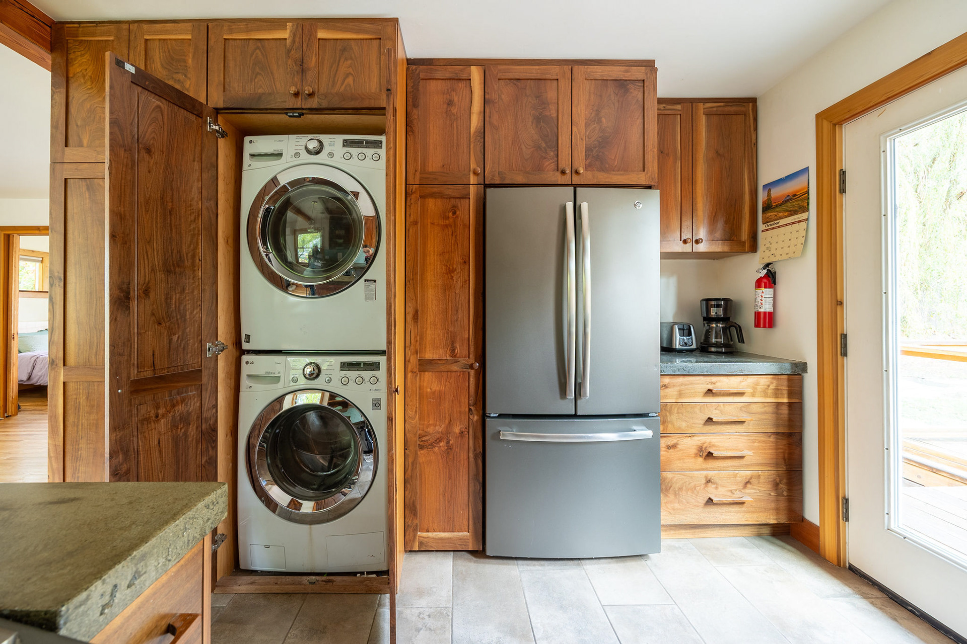 Airbnb listing photo. Cabinets by Renaissance Fine Woodworking.